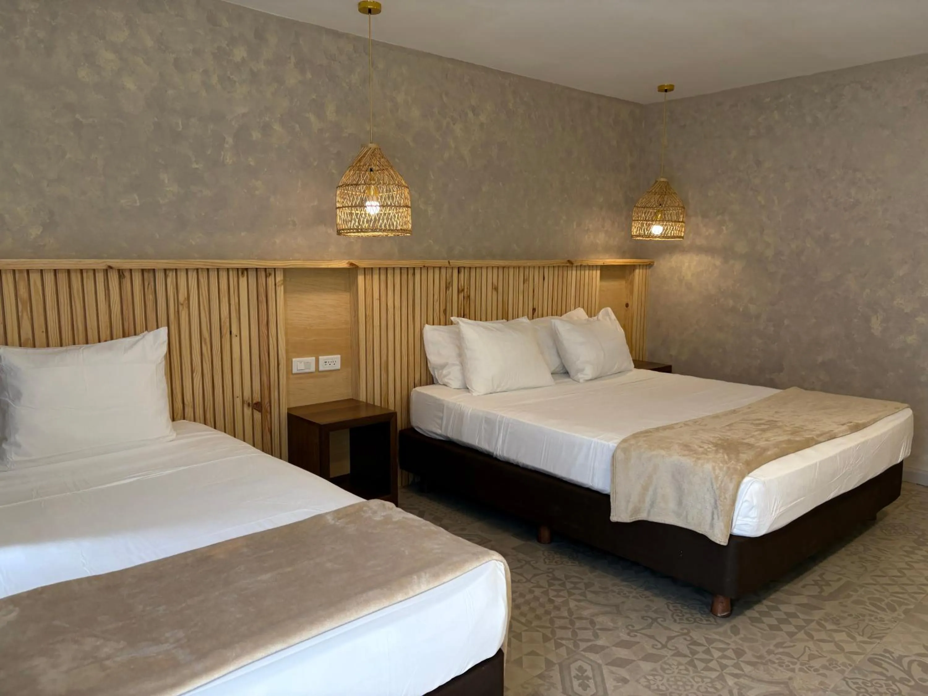 Bed in Hotel Blue Cove by On vacation