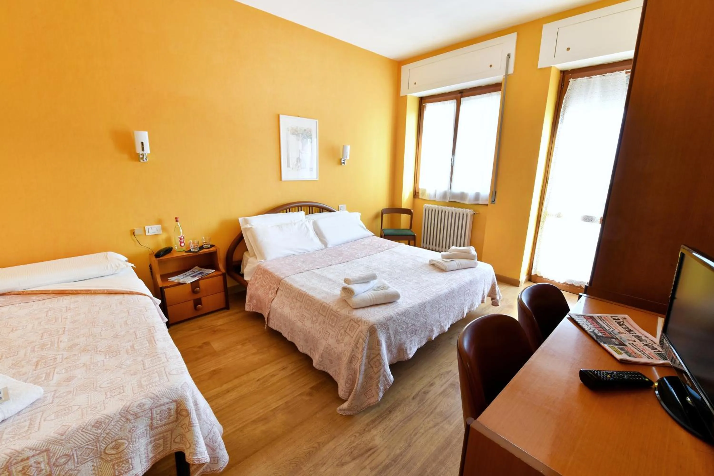Balcony/Terrace, Bed in Hotel Motel Europa