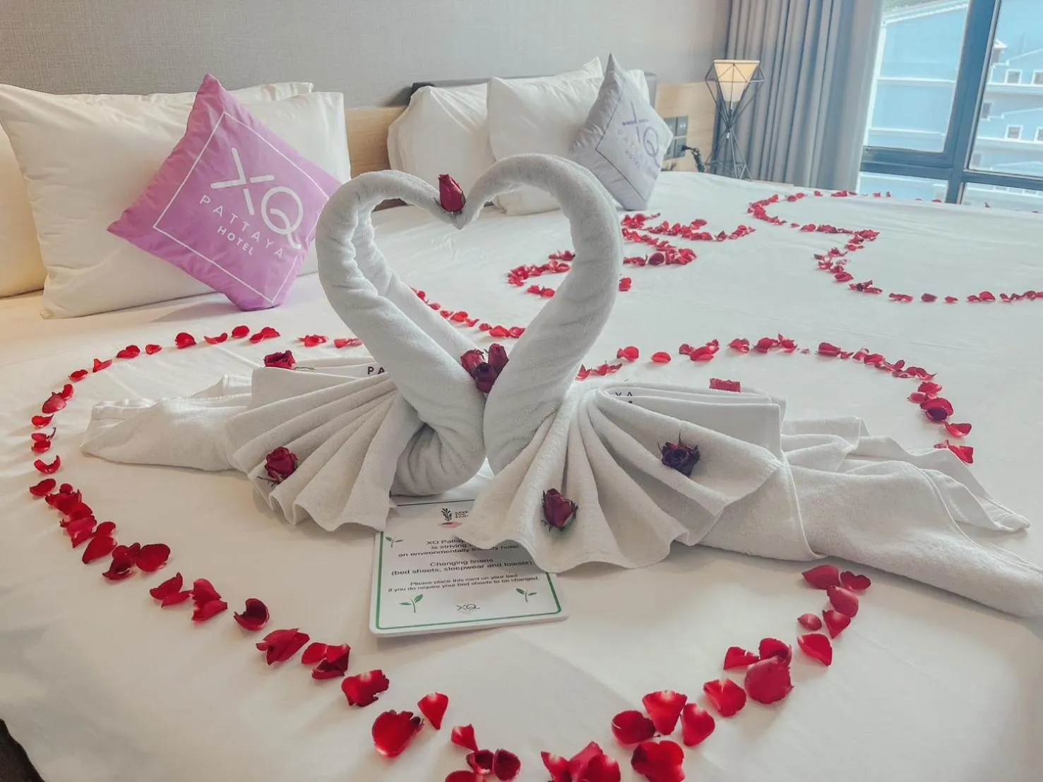 Bed in XQ Pattaya Hotel