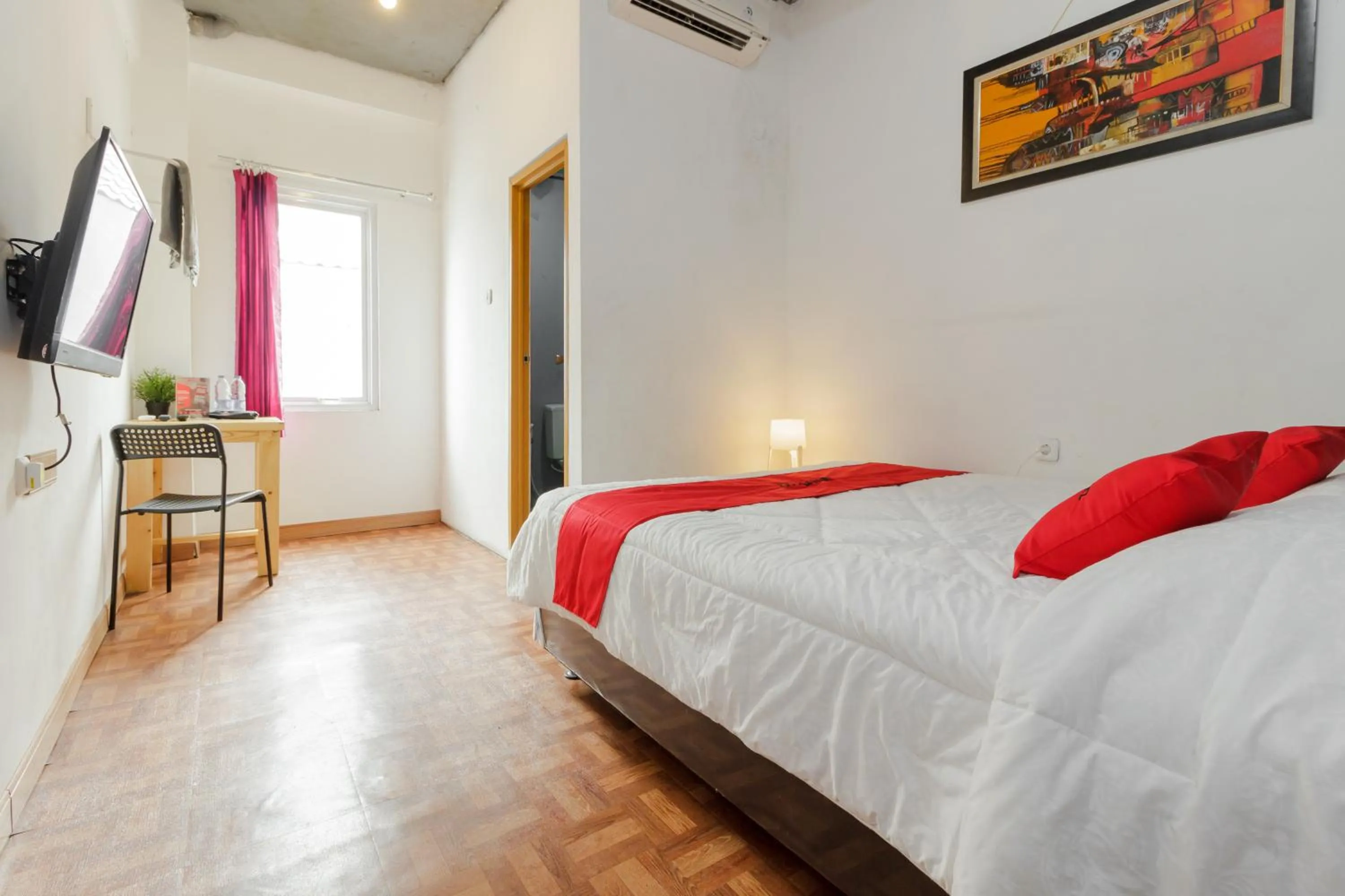 Bedroom in RedDoorz Syariah At Taman Bendungan Asahan