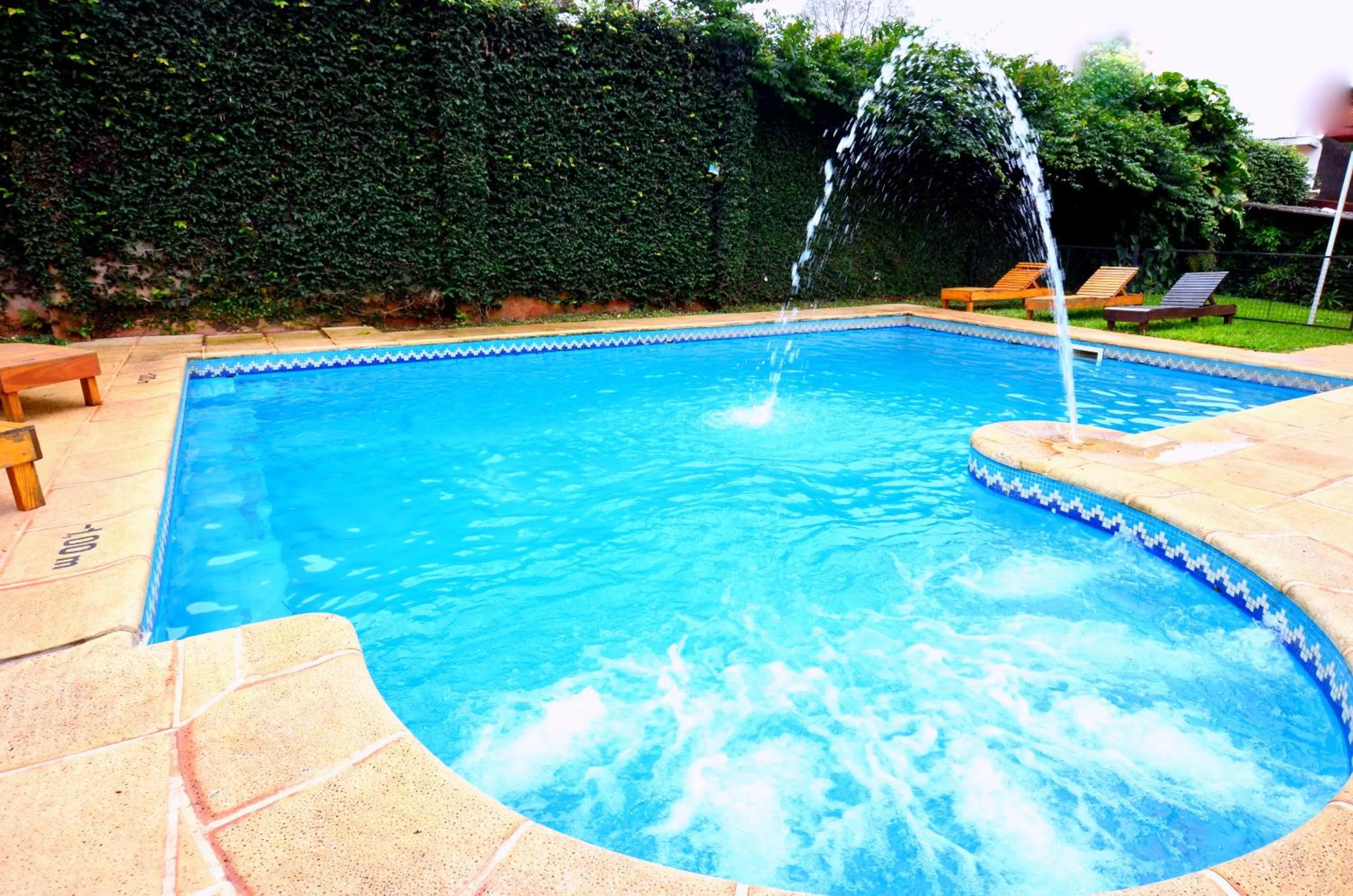 Swimming pool in Hostería Casa Blanca Iguazú