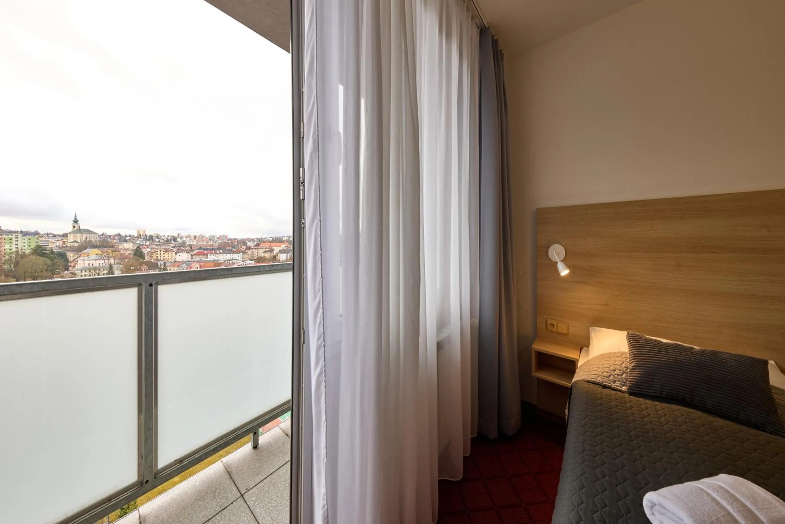 View (from property/room), Bed in PATRIA HOTEL