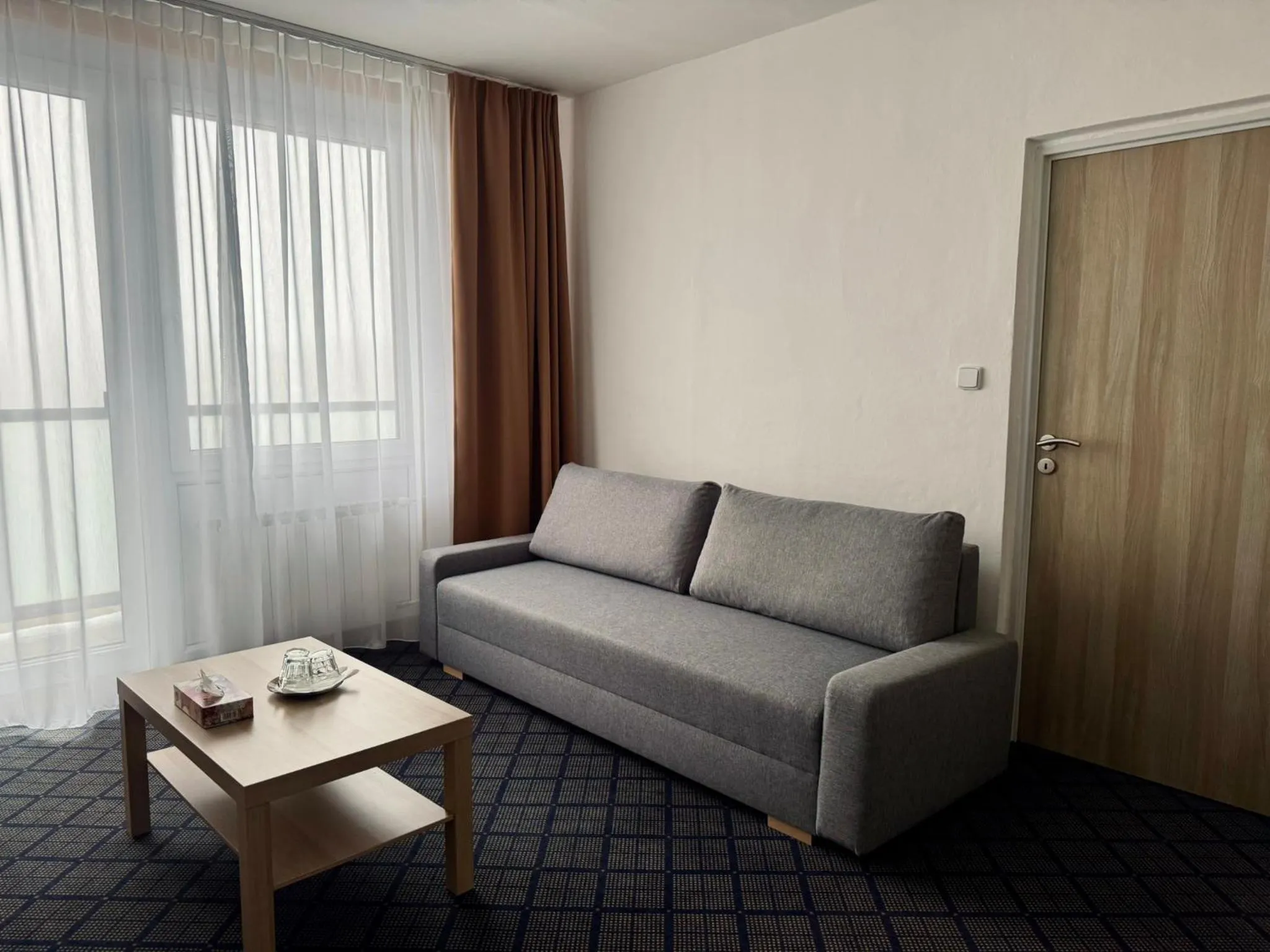 Living room in PATRIA HOTEL