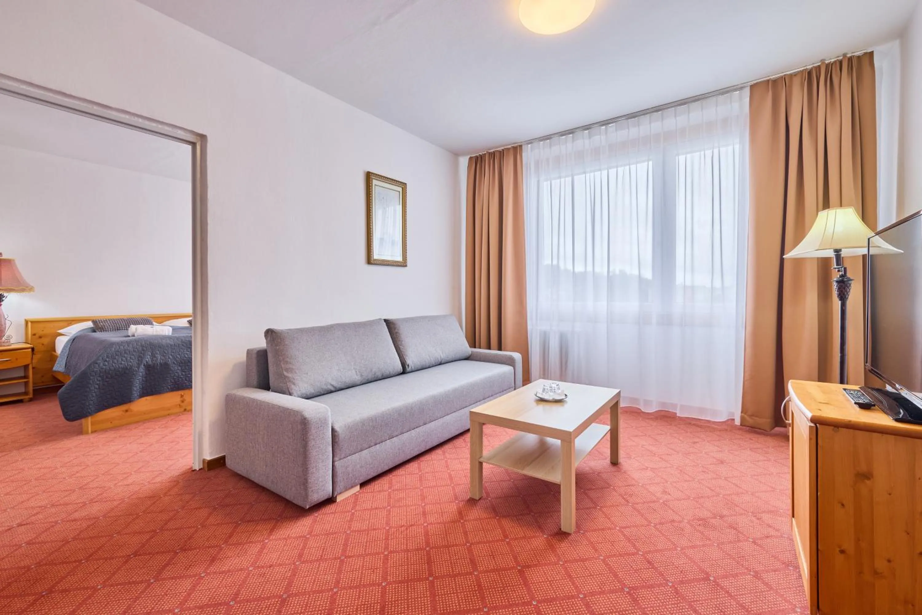 Seating area, Bed in PATRIA HOTEL