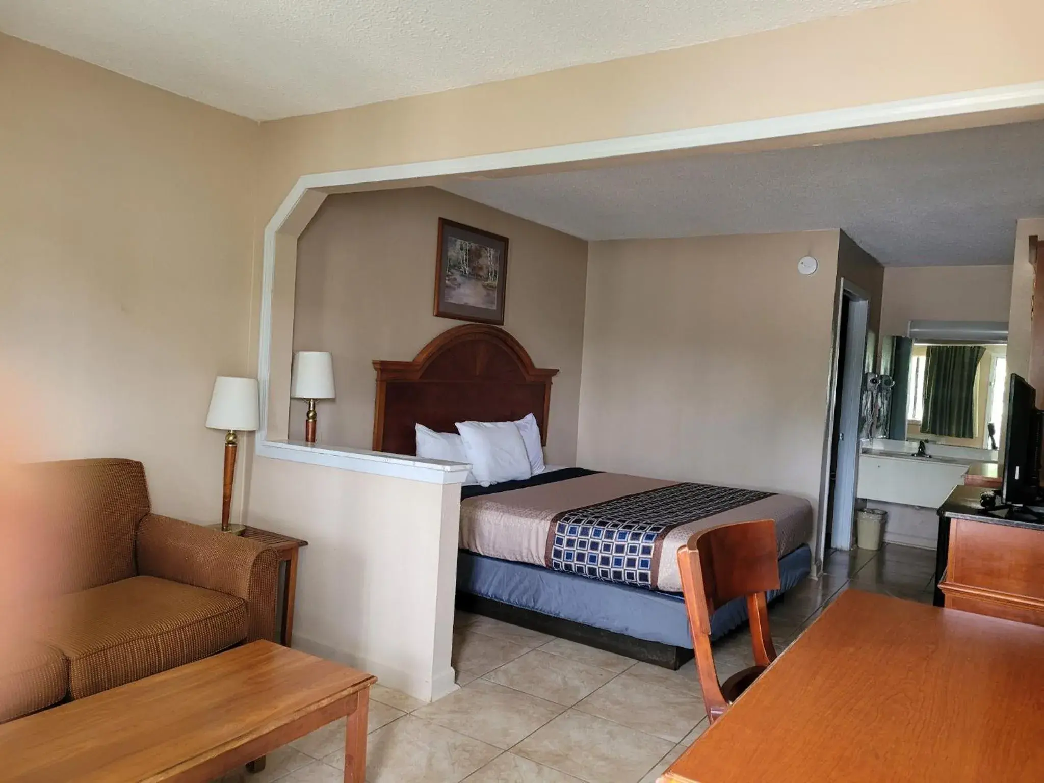 Photo of the whole room, Bed in Highland Inn Denham Springs Baton Rouge East Photo of the whole room, Bed in Highland Inn Denham Springs Baton Rouge East