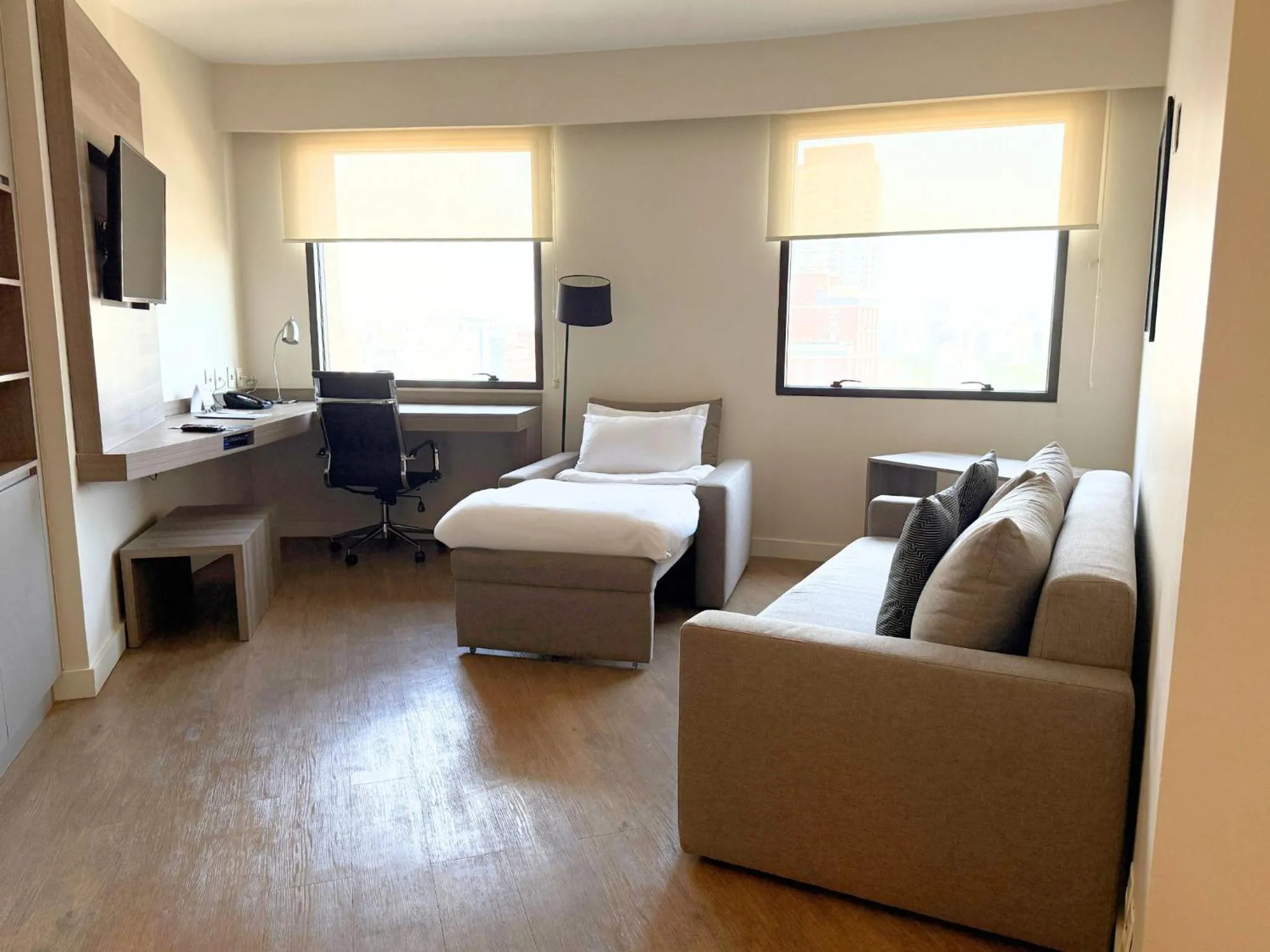 Living room, Bed in Staybridge Suites São Paulo by IHG
