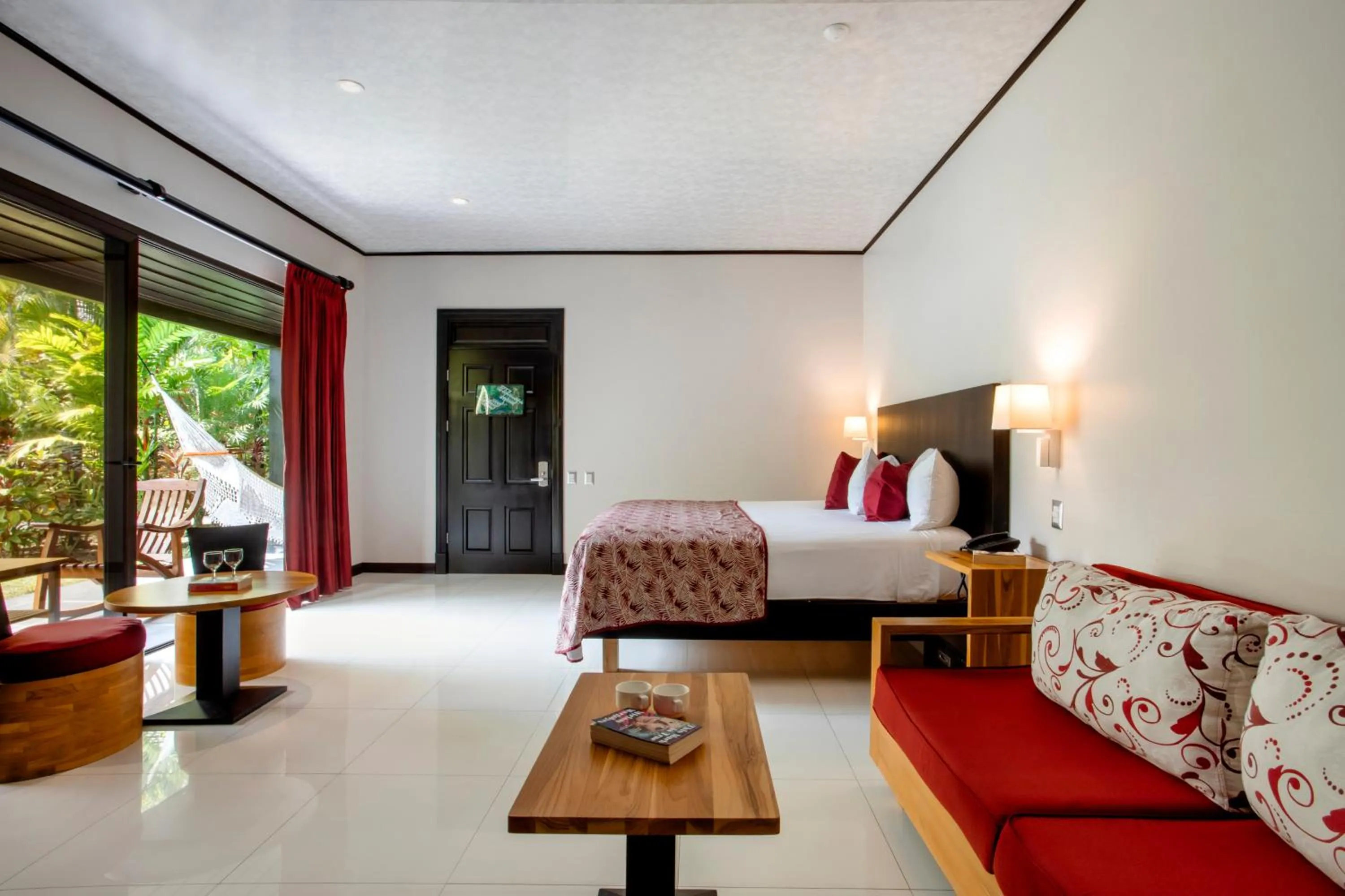 Photo of the whole room, Bed in Arenal Manoa Resort & Hot Springs