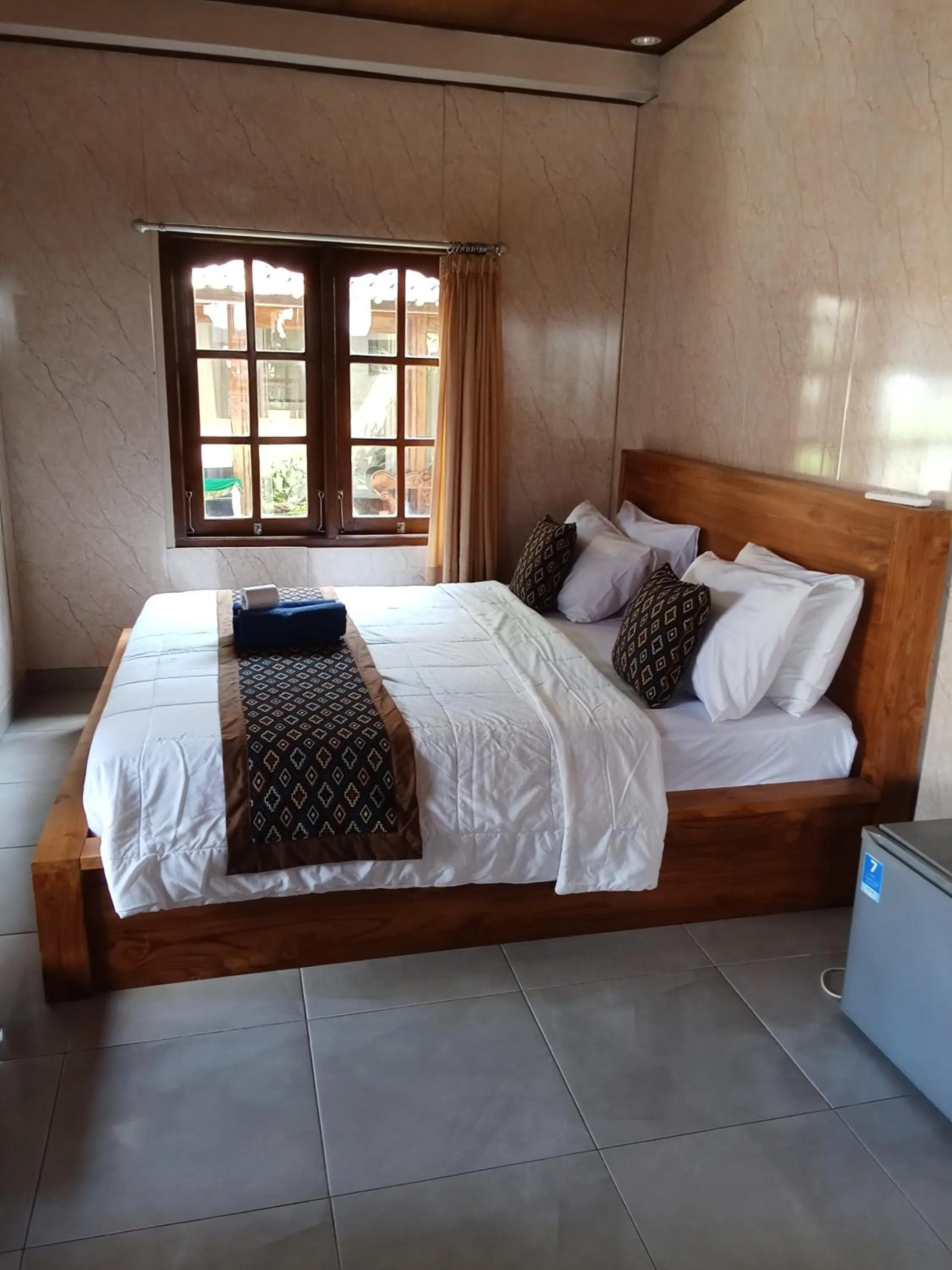 Bed in Dewi Antara Homestay