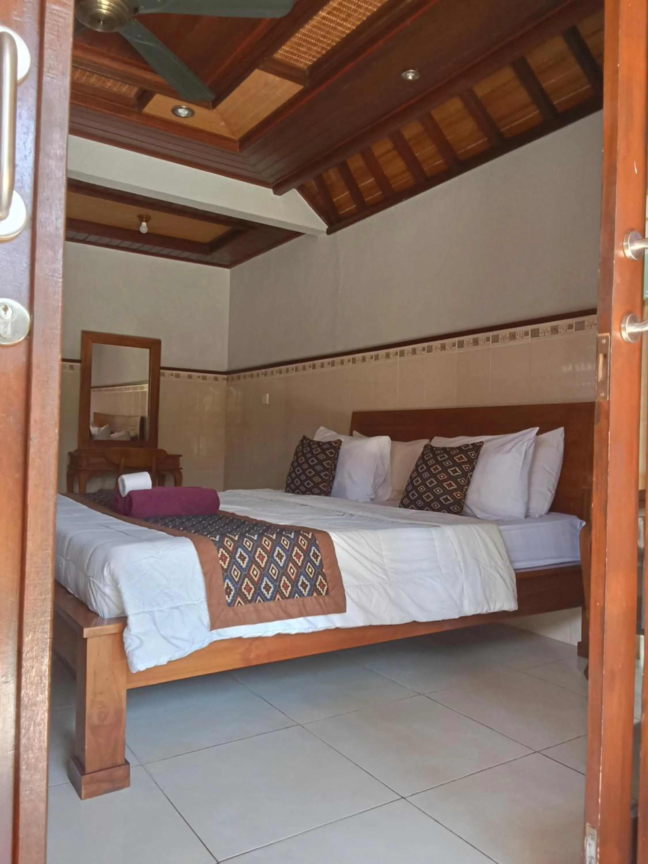 Bed in Dewi Antara Homestay