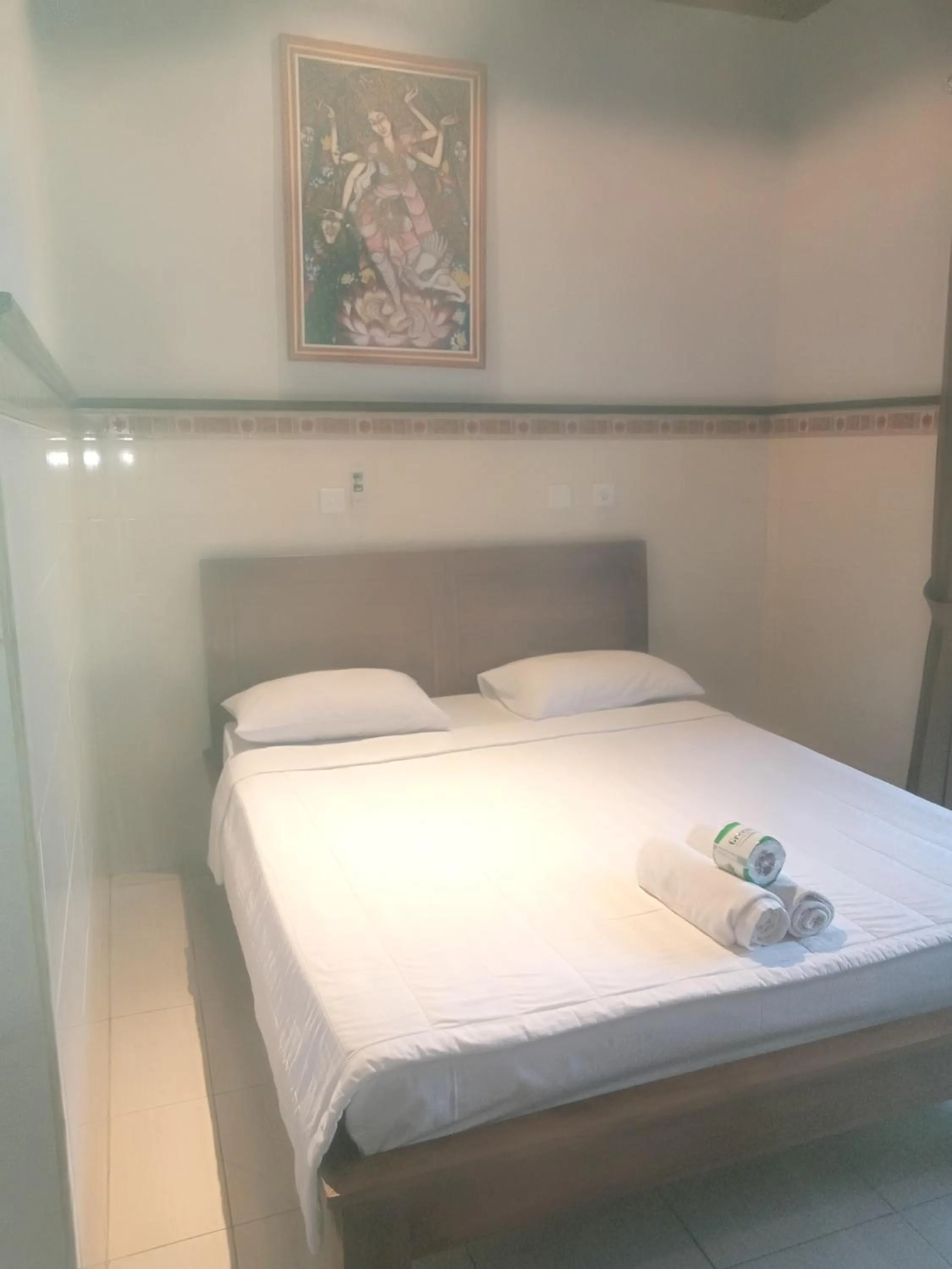 Bed in Dewi Antara Homestay