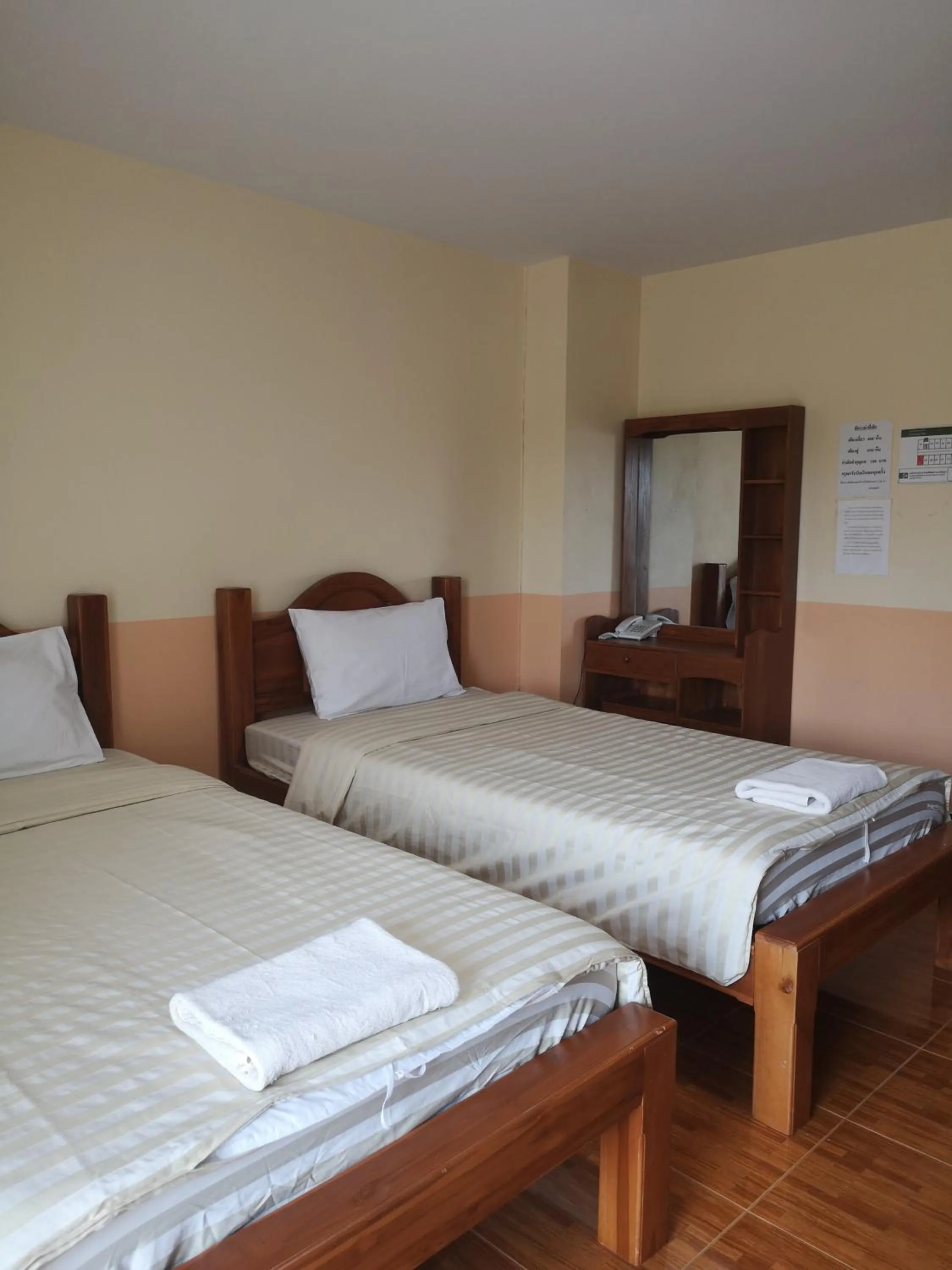 Bed in Sab Suwarn Mansion