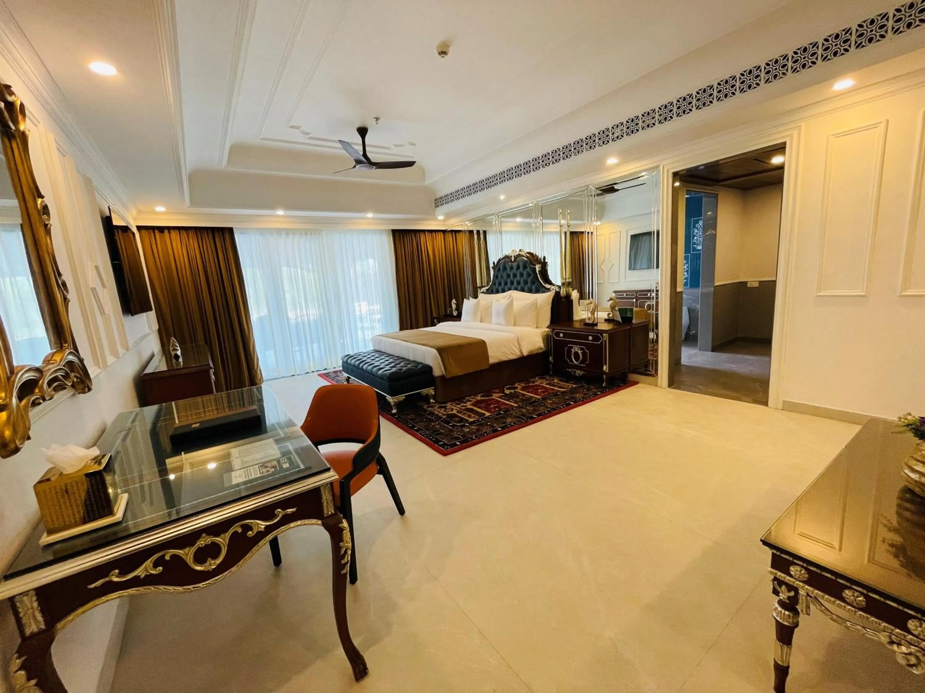 Bed in Mayfair Palm Beach Resort