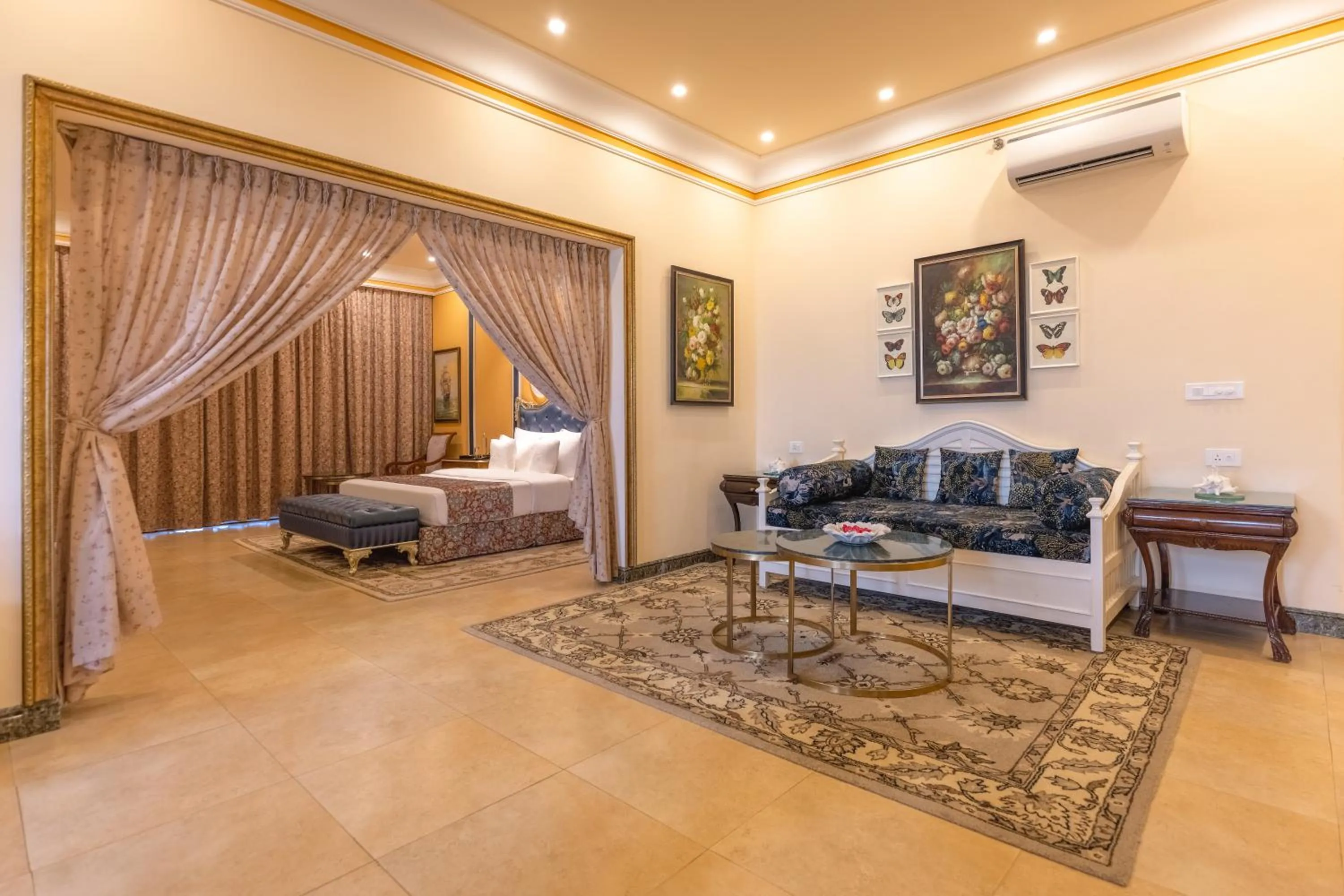 Living room, Bed in Mayfair Palm Beach Resort