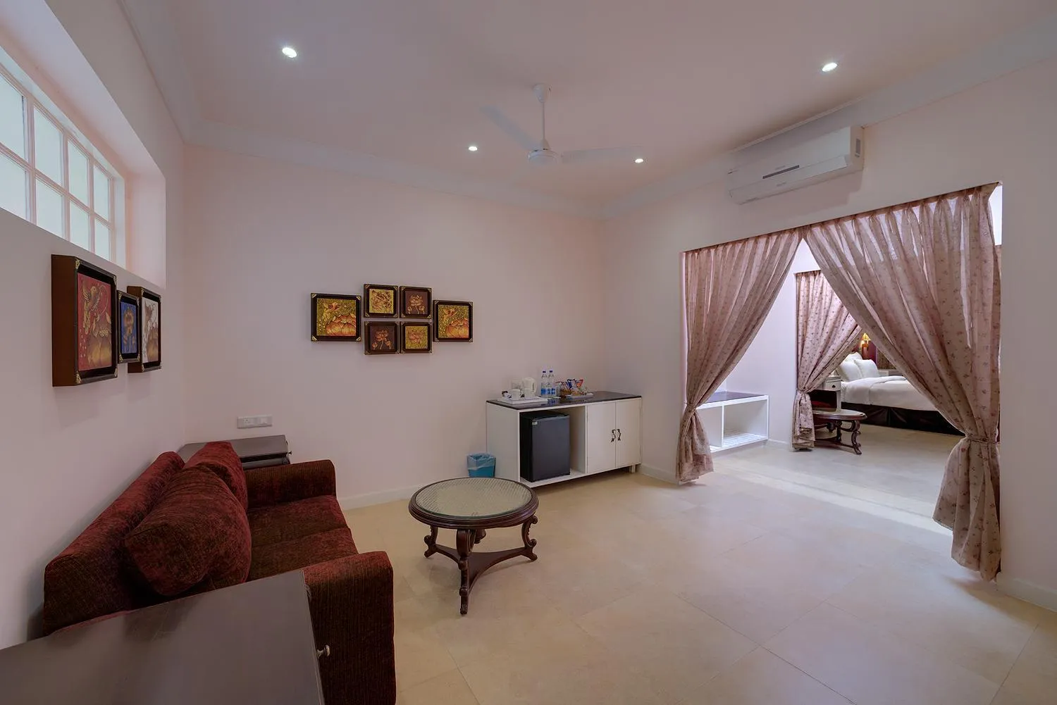 Living room, Bed in Mayfair Palm Beach Resort