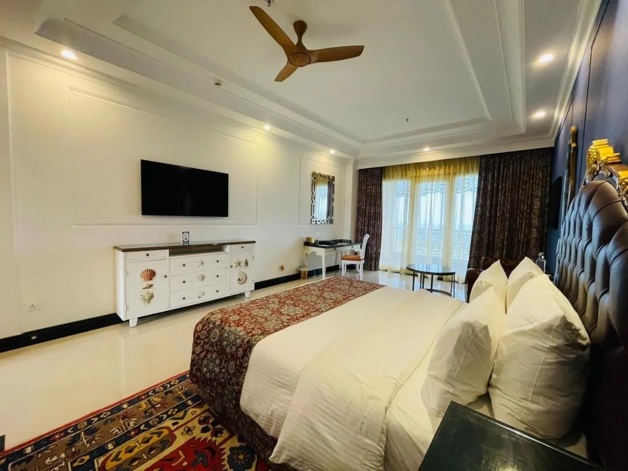 Bed in Mayfair Palm Beach Resort