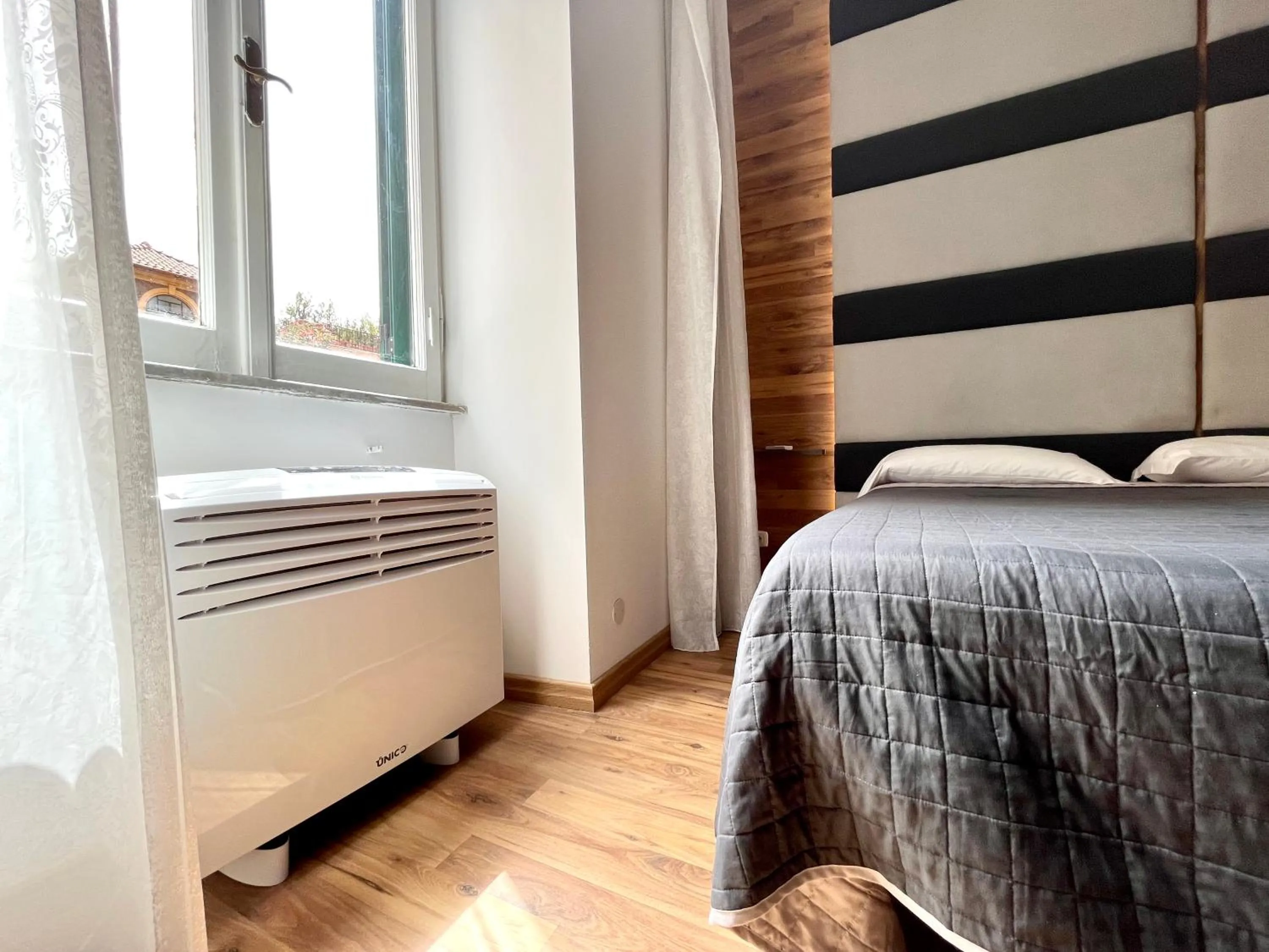 Bed in I Pini di Roma - Rooms & Suites