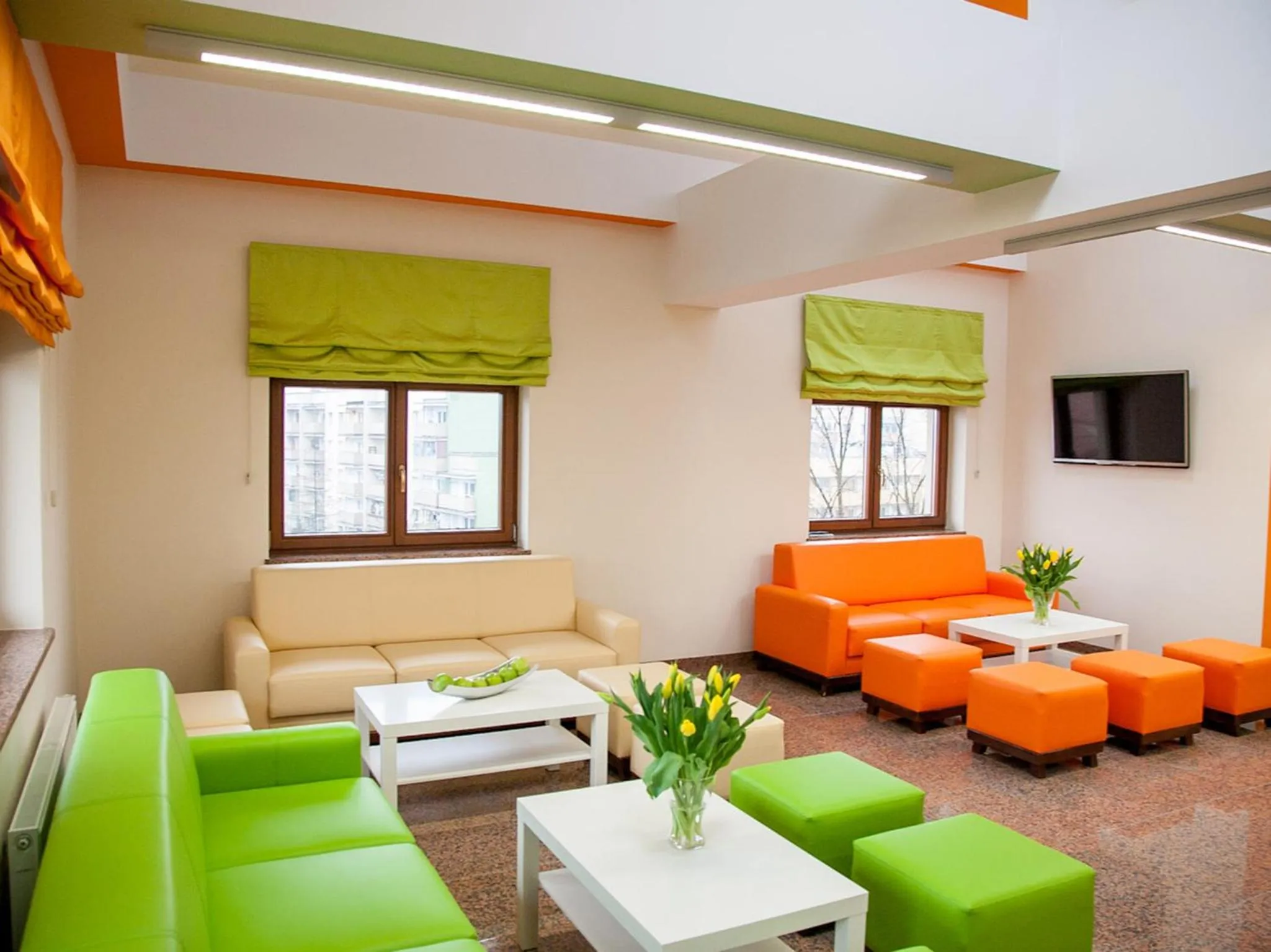 Communal lounge/ TV room in Domus Mater Hotel