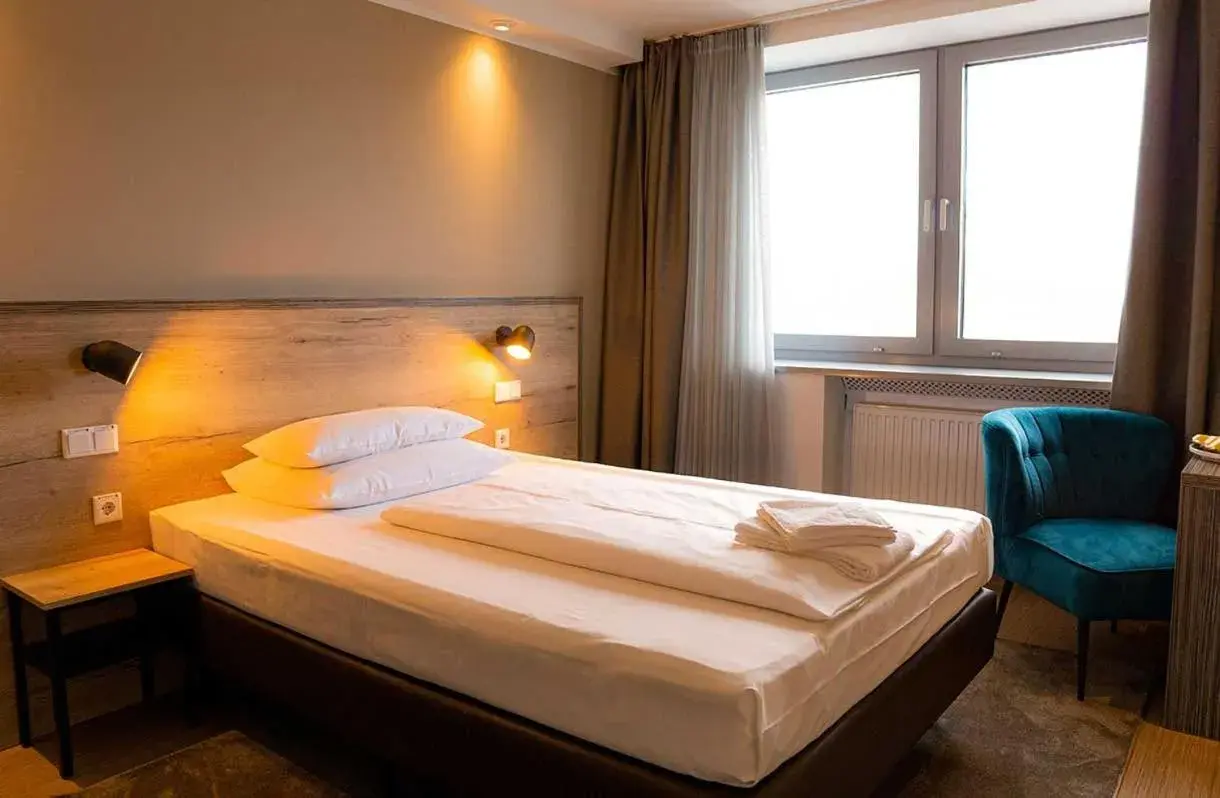 Bed in Hotel Sportforum Bed in Hotel Sportforum