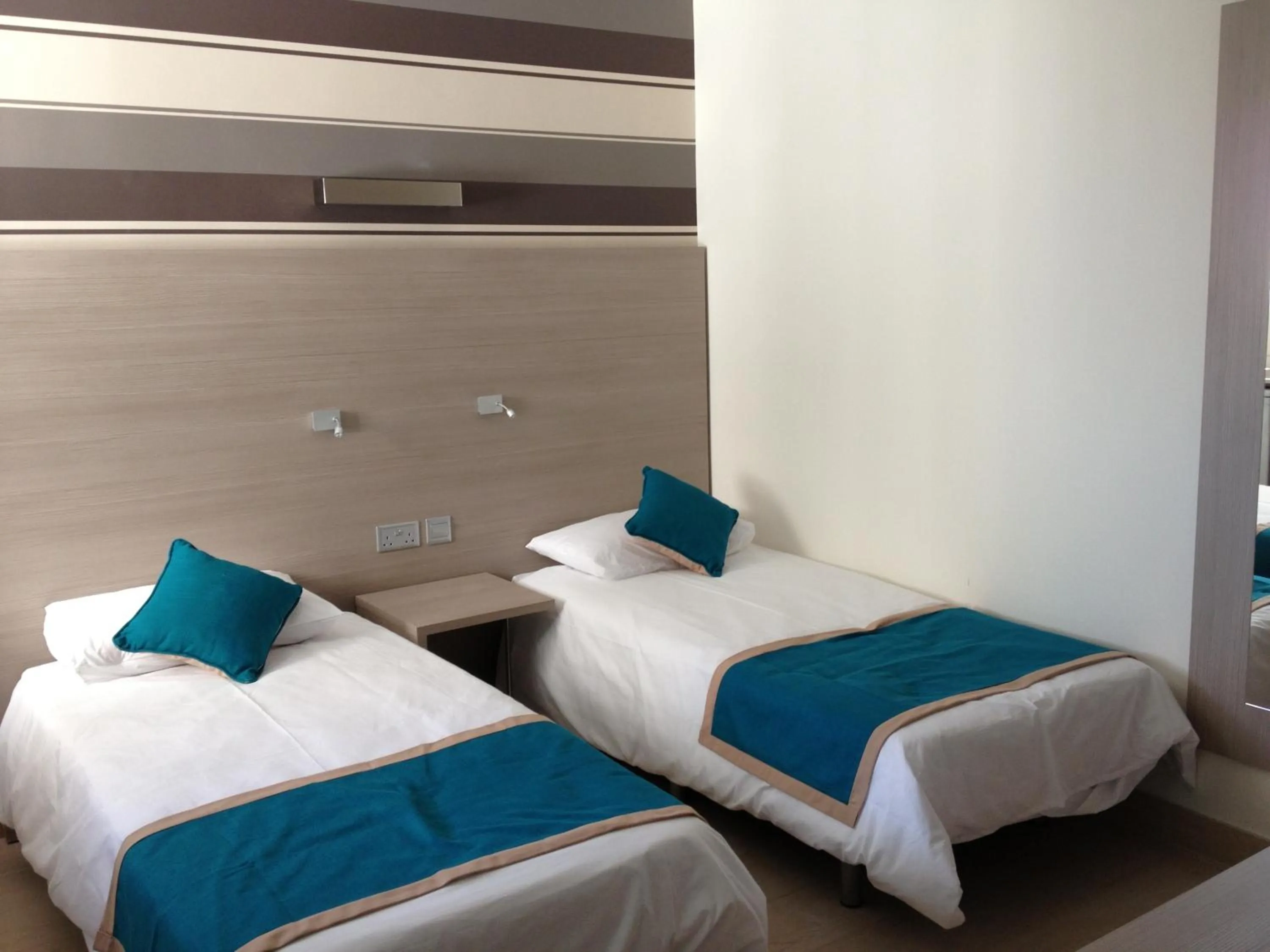 Bed in Day's Inn Hotel and Residence