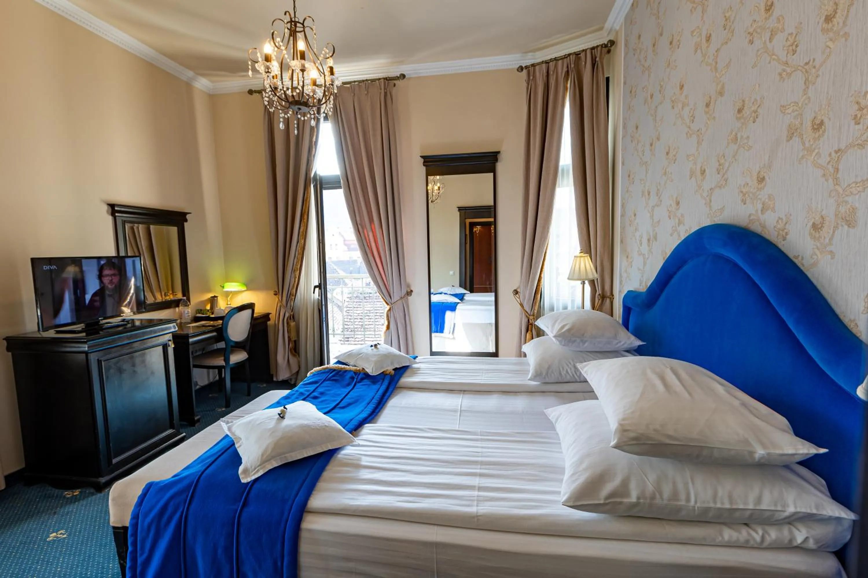 Bed in Hotel Central Park Sighisoara