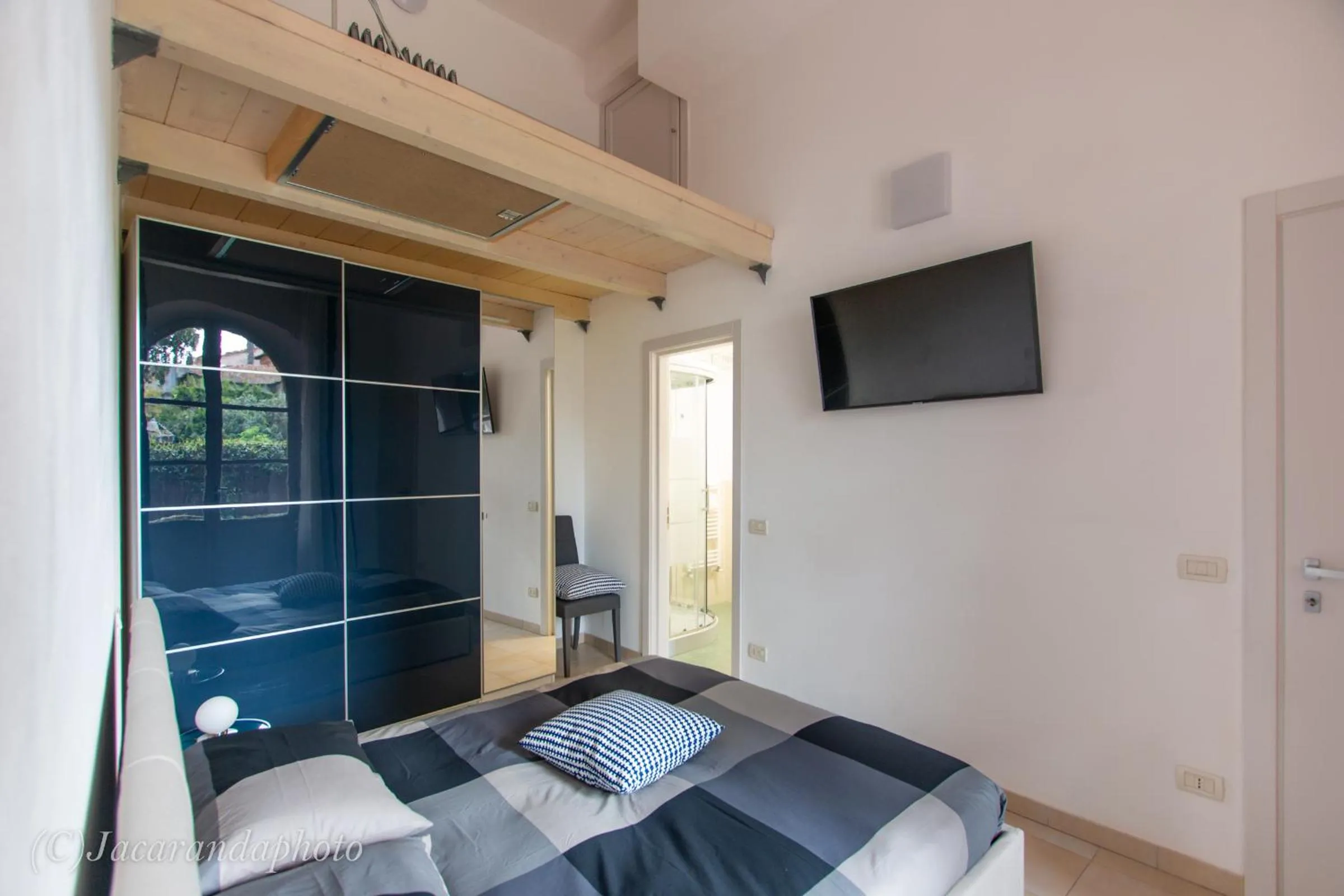 Bed in La Suite di Bonnes Vacances