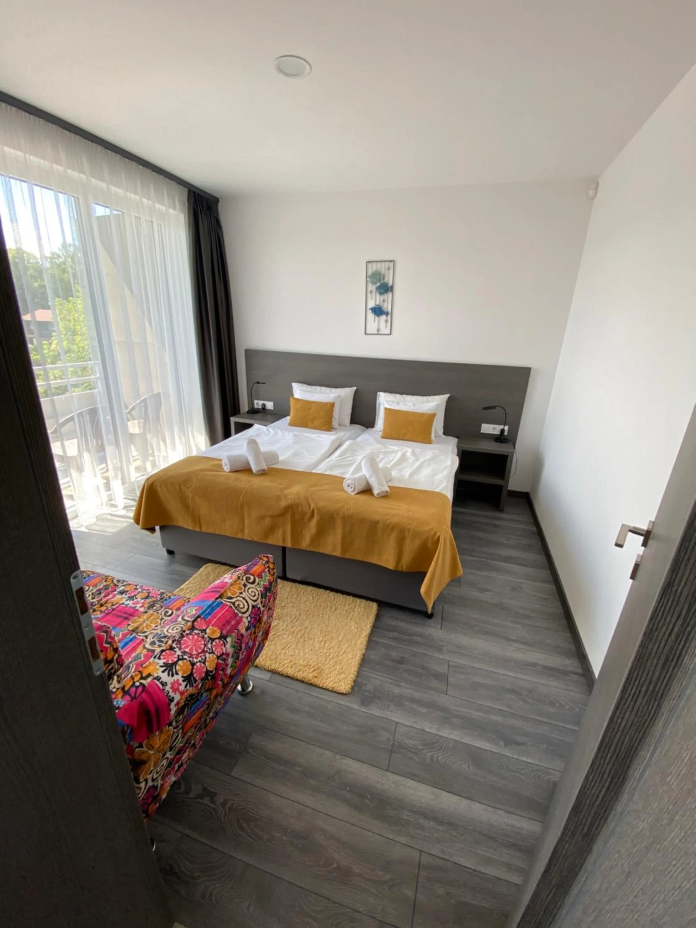 Bed in HOTEL CSOPAK Resort & Lake