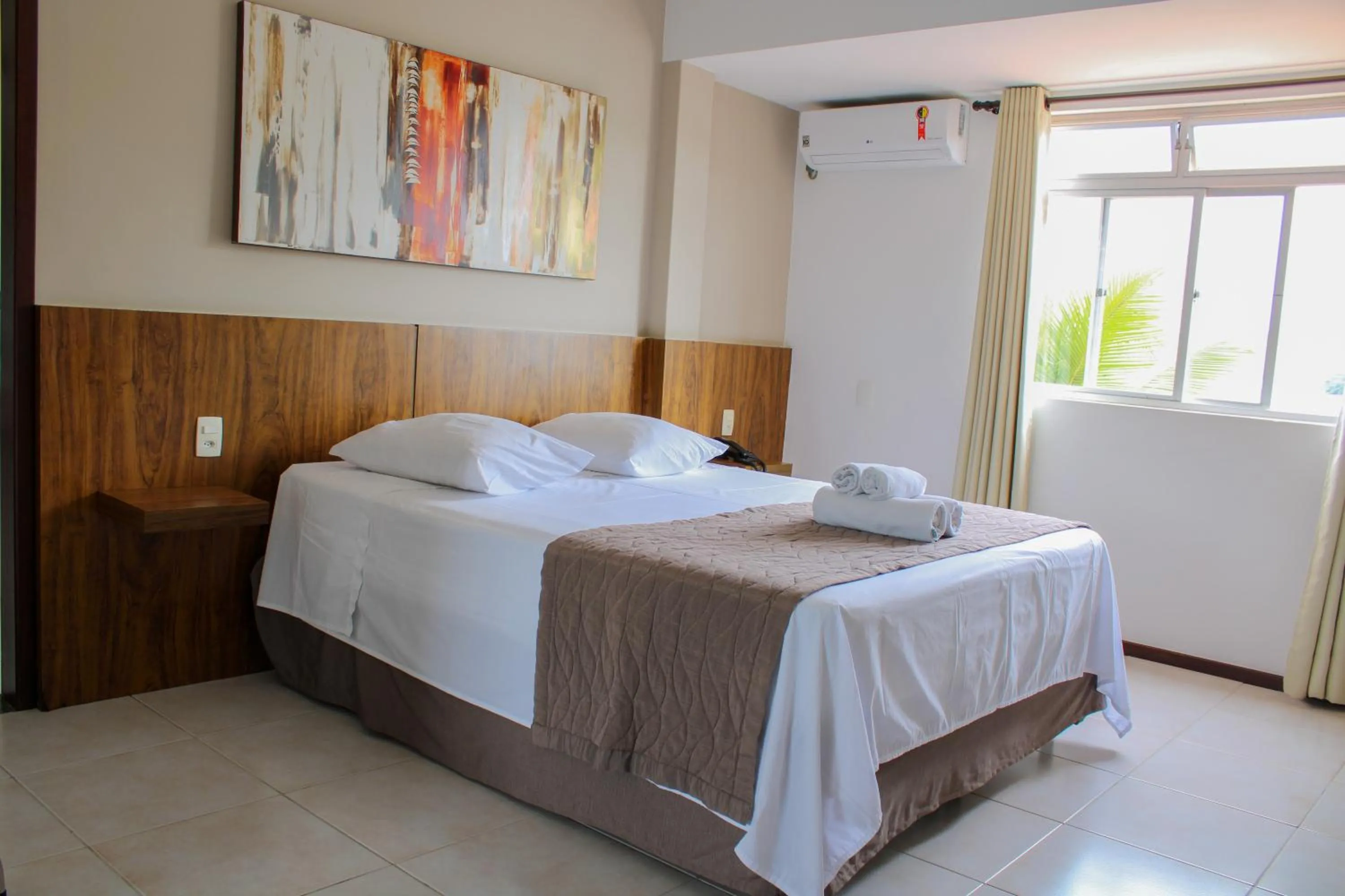 Bed in Cyrilo's Palace Hotel