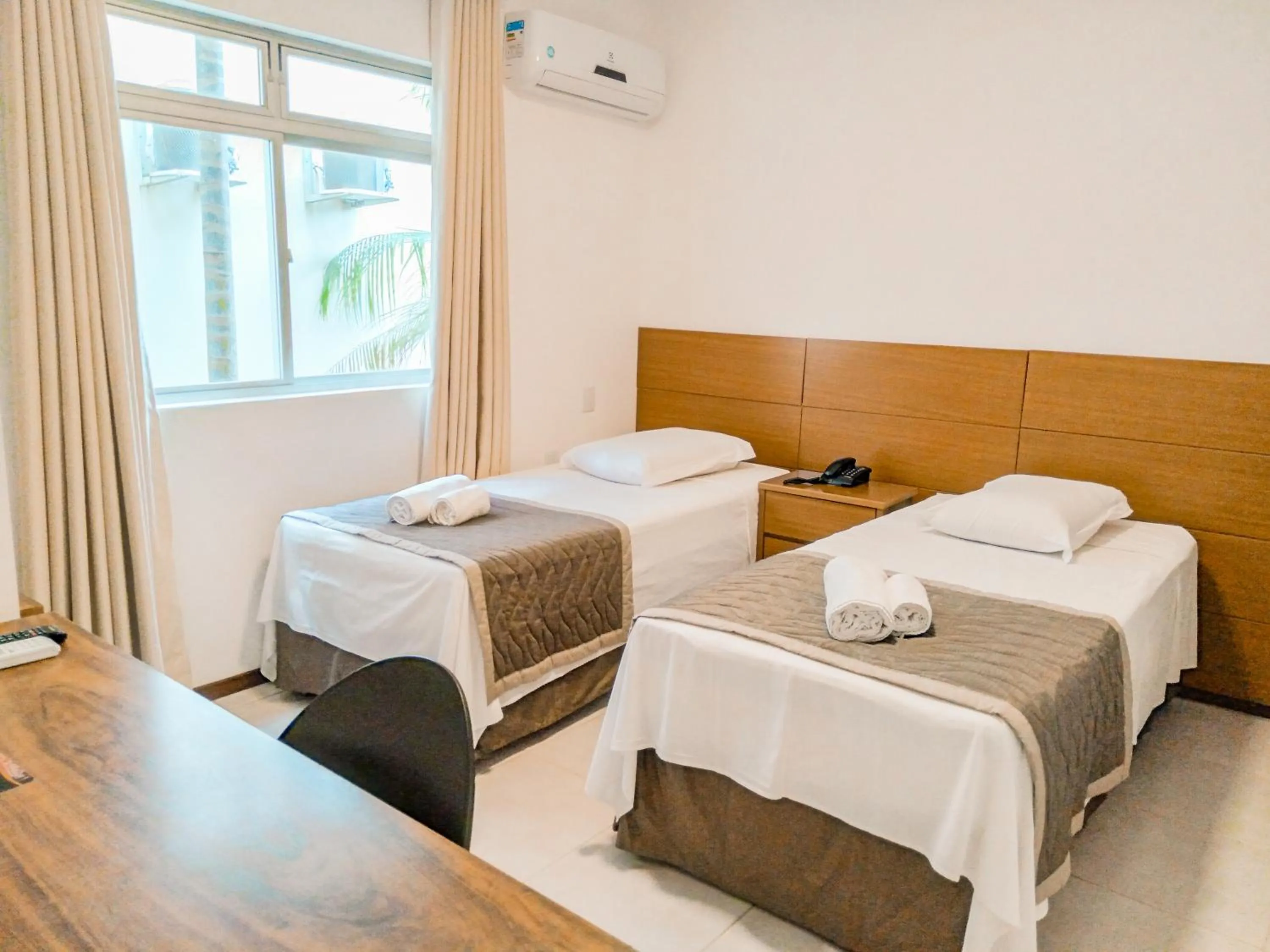 Bed in Cyrilo's Palace Hotel