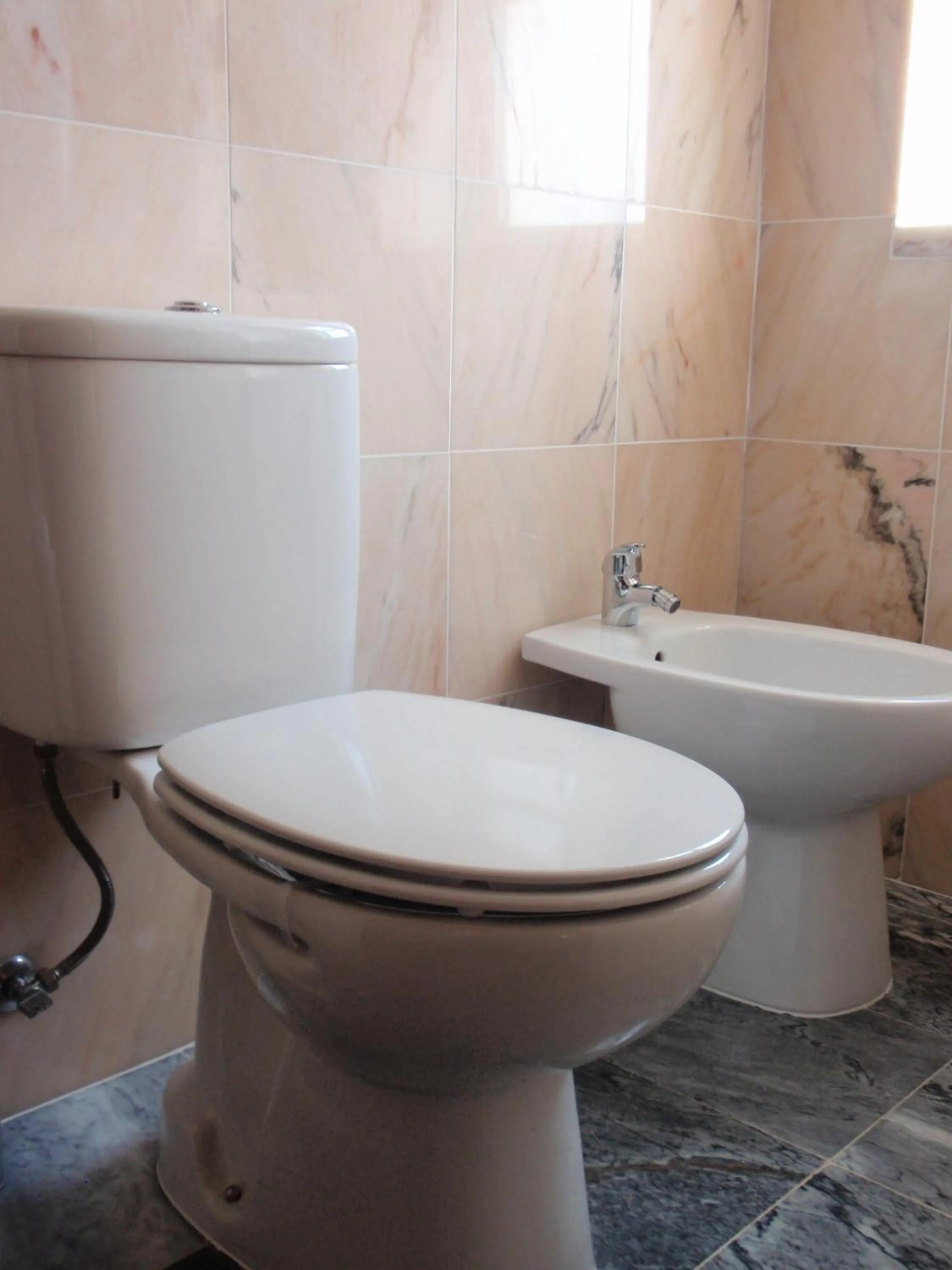 Bathroom in "O Viajante" Low Cost Hotel