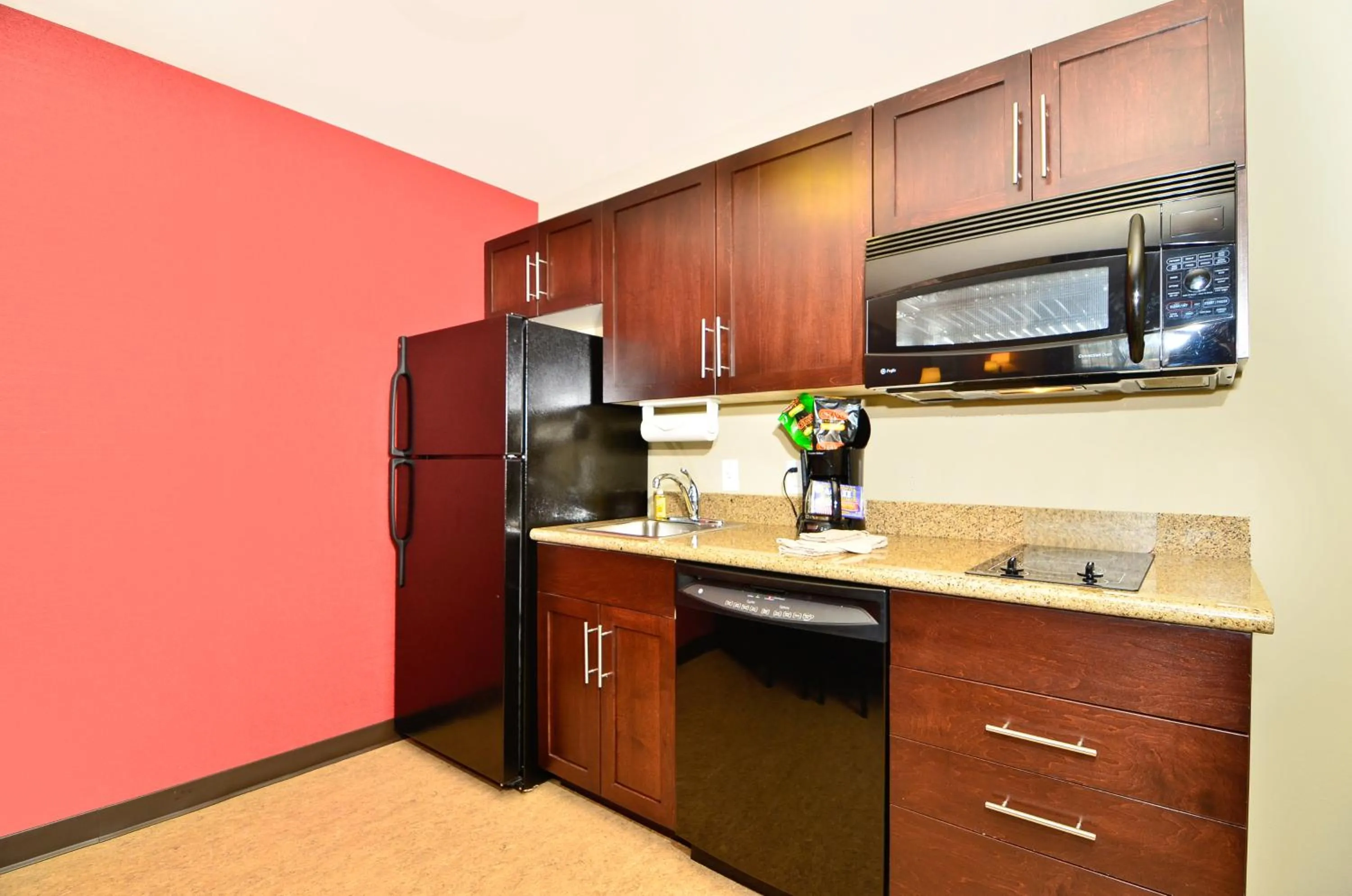 Kitchen or kitchenette in Hawthorn Suites by Wyndham Williston