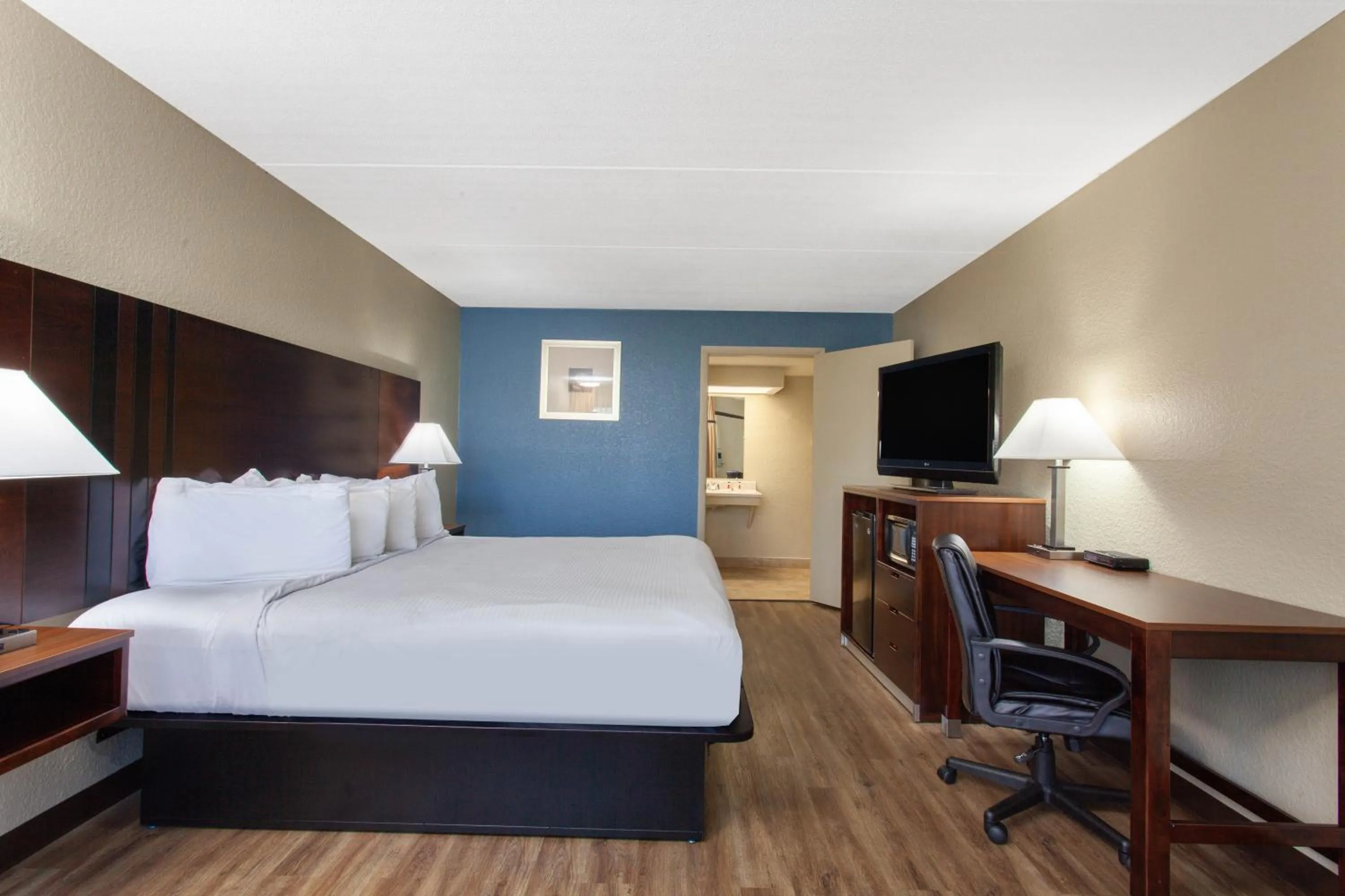 Bed in Travelodge by Wyndham Deltona