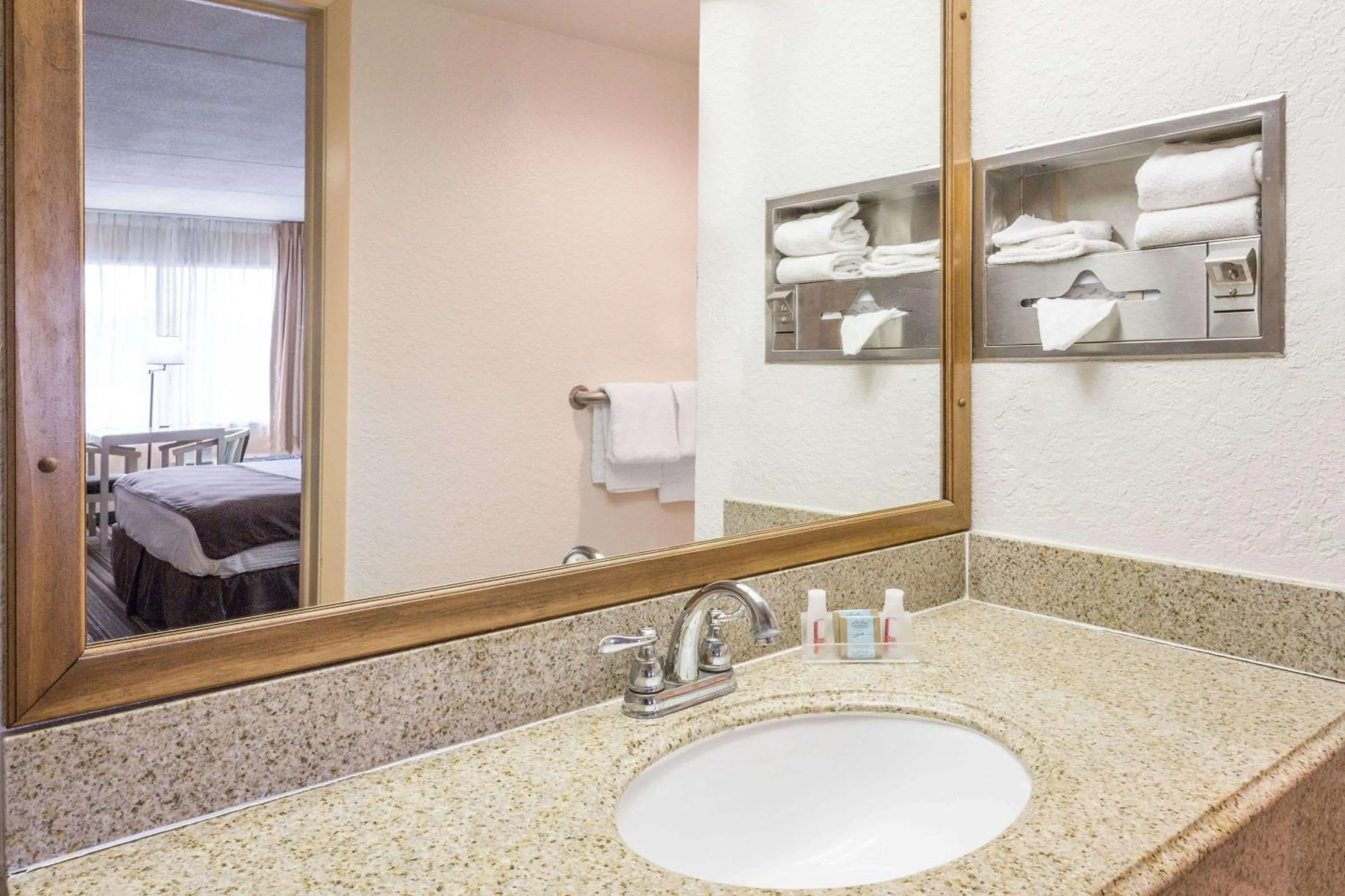 Bathroom in Travelodge by Wyndham Deltona