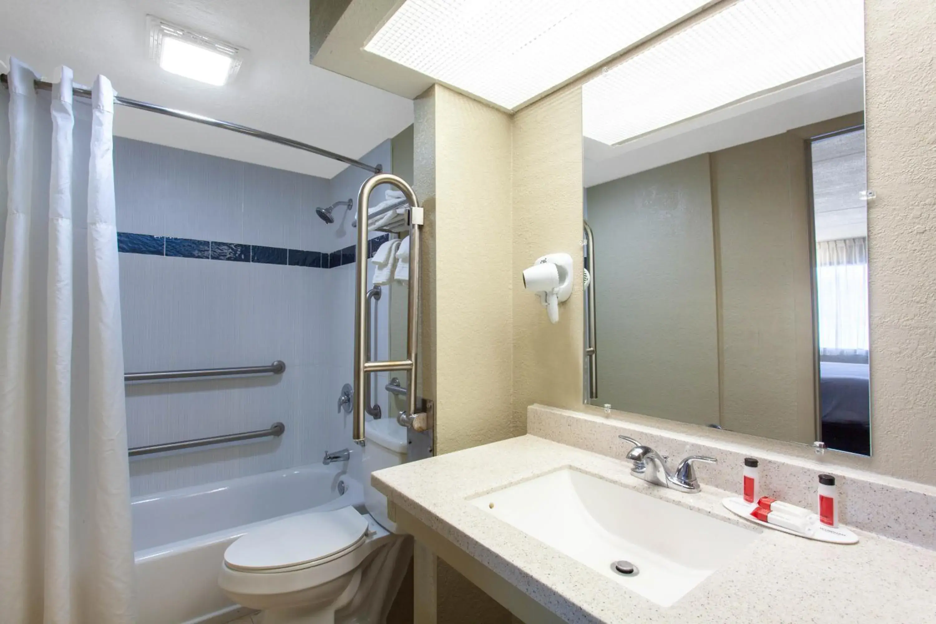 King Room with Roll-In Shower - Mobility/Hearing Accessible - Non-Smoking in Travelodge by Wyndham Deltona King Room with Roll-In Shower - Mobility/Hearing Accessible - Non-Smoking in Travelodge by Wyndham Deltona