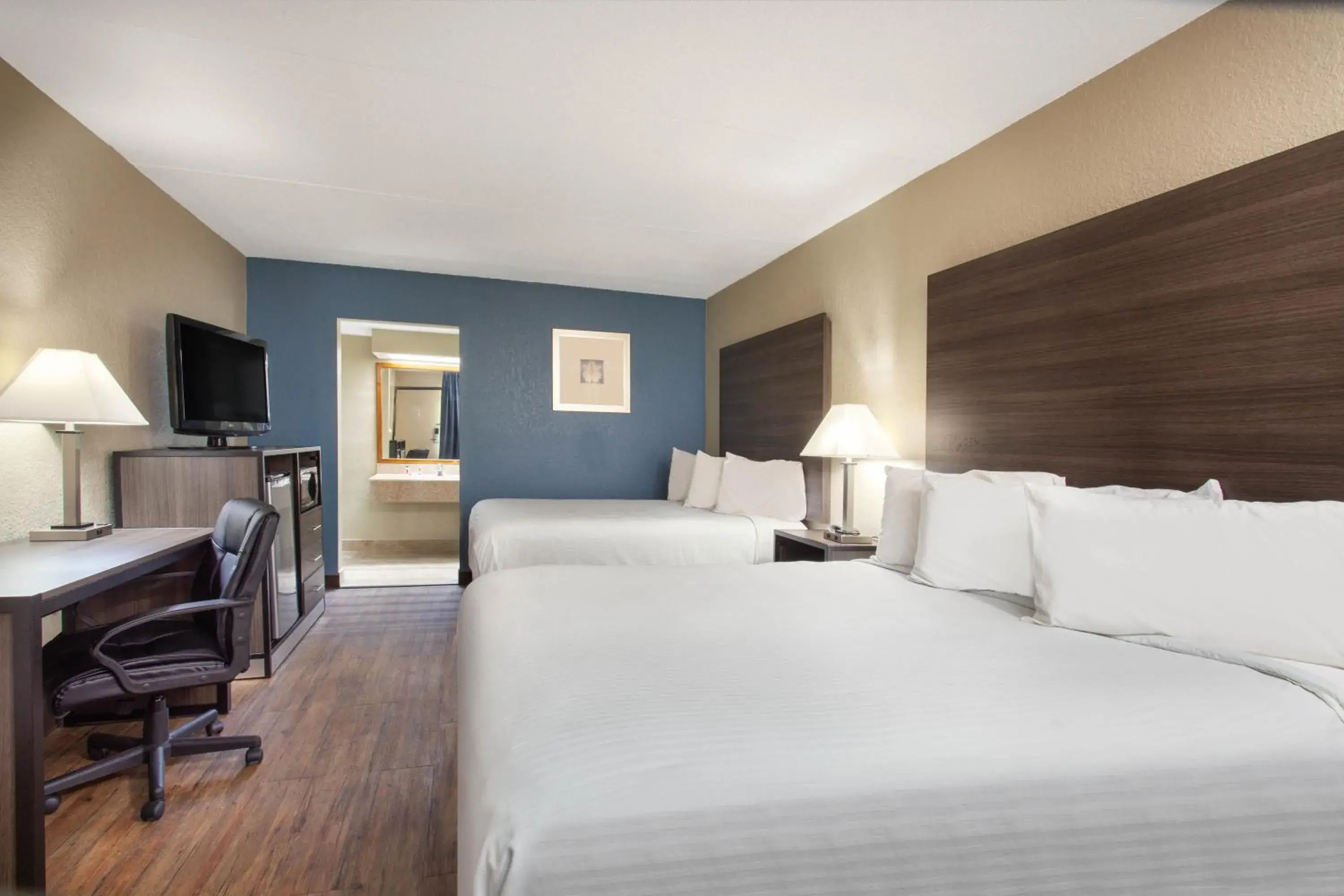 Queen Room with Two Queen Beds - Non-Smoking in Travelodge by Wyndham Deltona Queen Room with Two Queen Beds - Non-Smoking in Travelodge by Wyndham Deltona