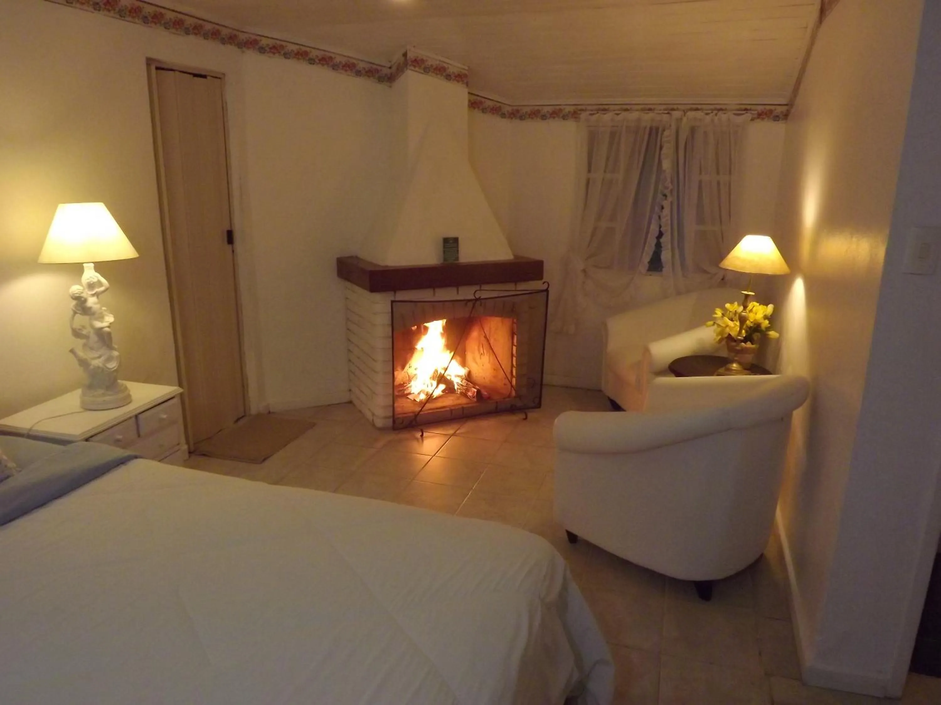 Seating area, Bed in Hotel Vivenda Penedo