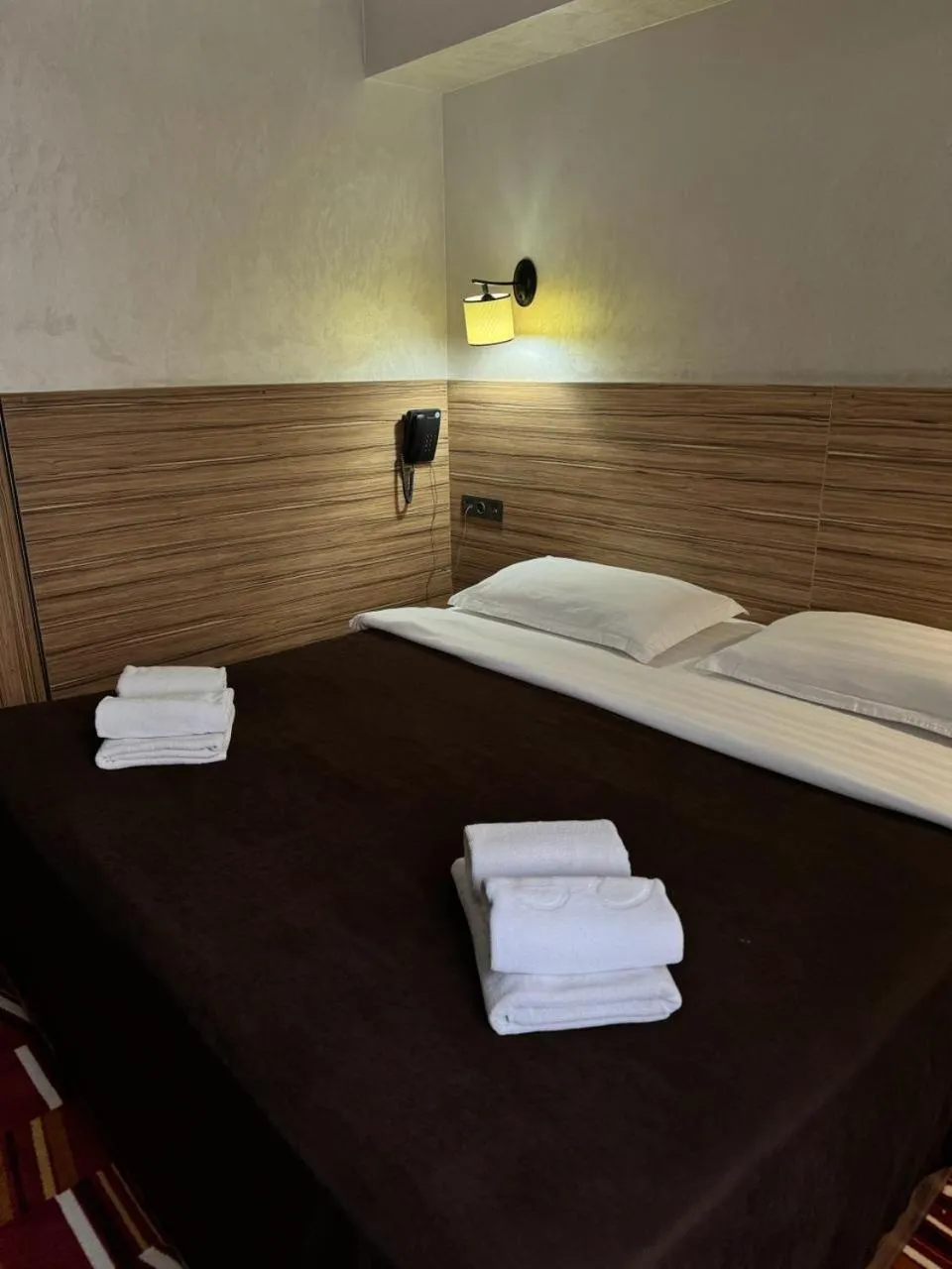 Bed in Mildom City Hotel