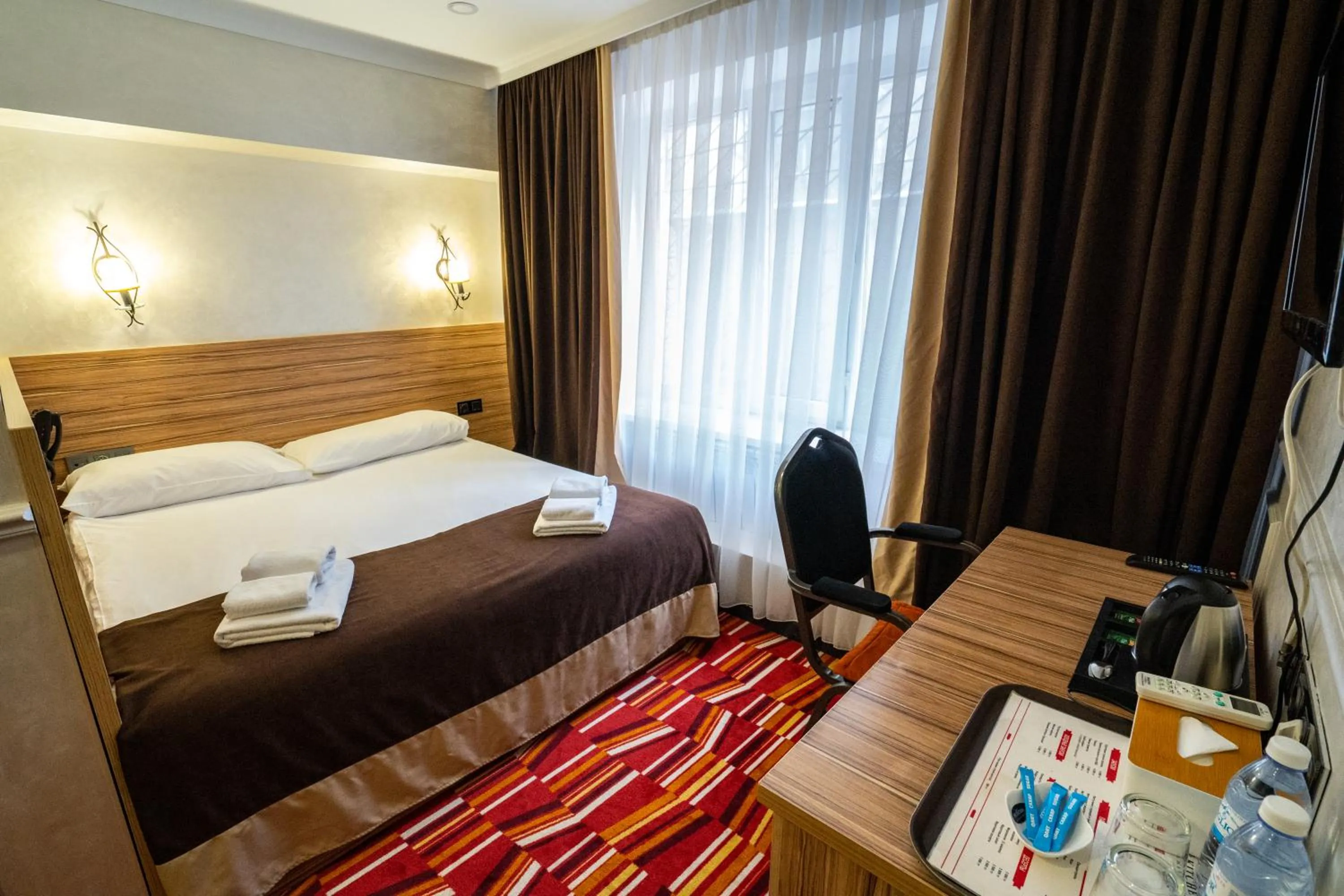 Bed in Mildom City Hotel