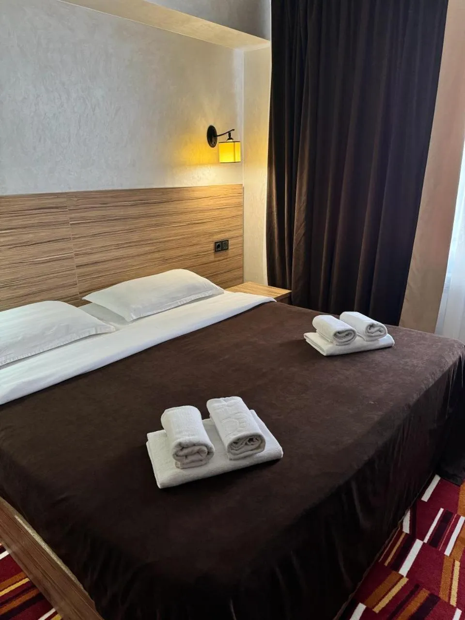 Bed in Mildom City Hotel