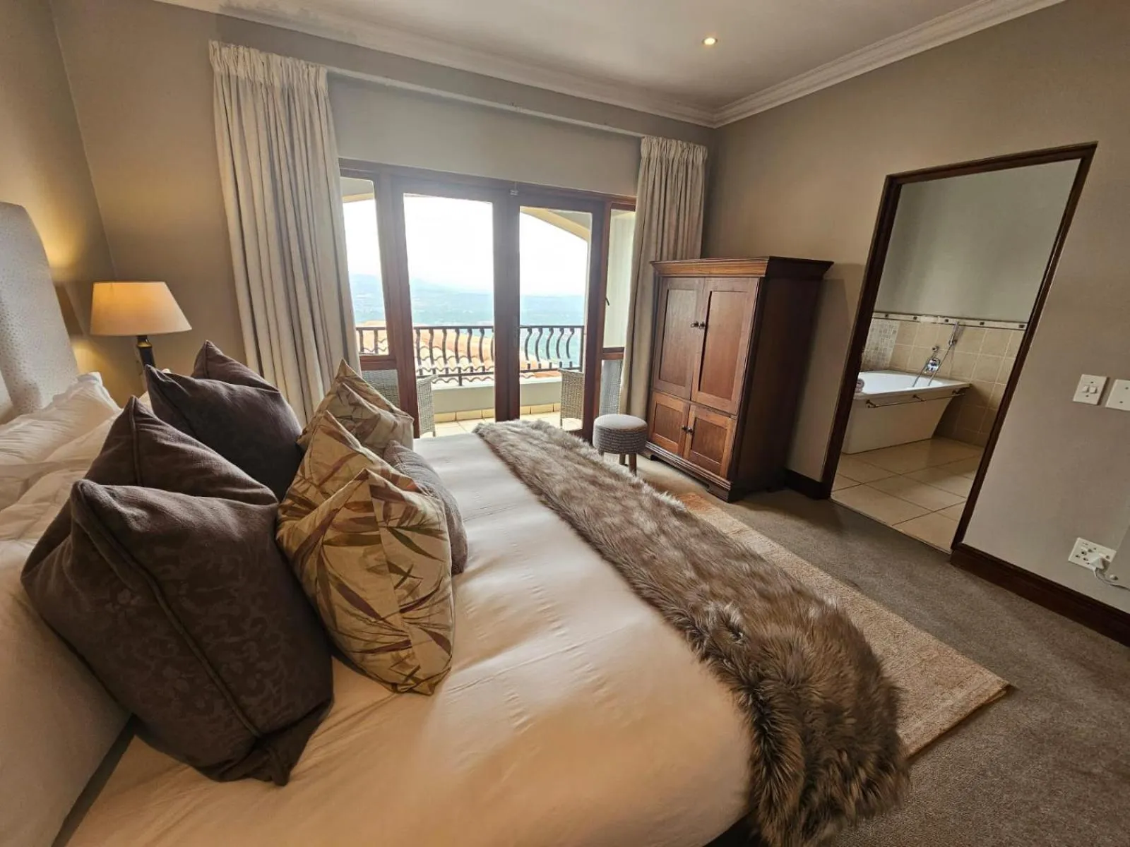 Bed in The Northcliff Boutique Hotel