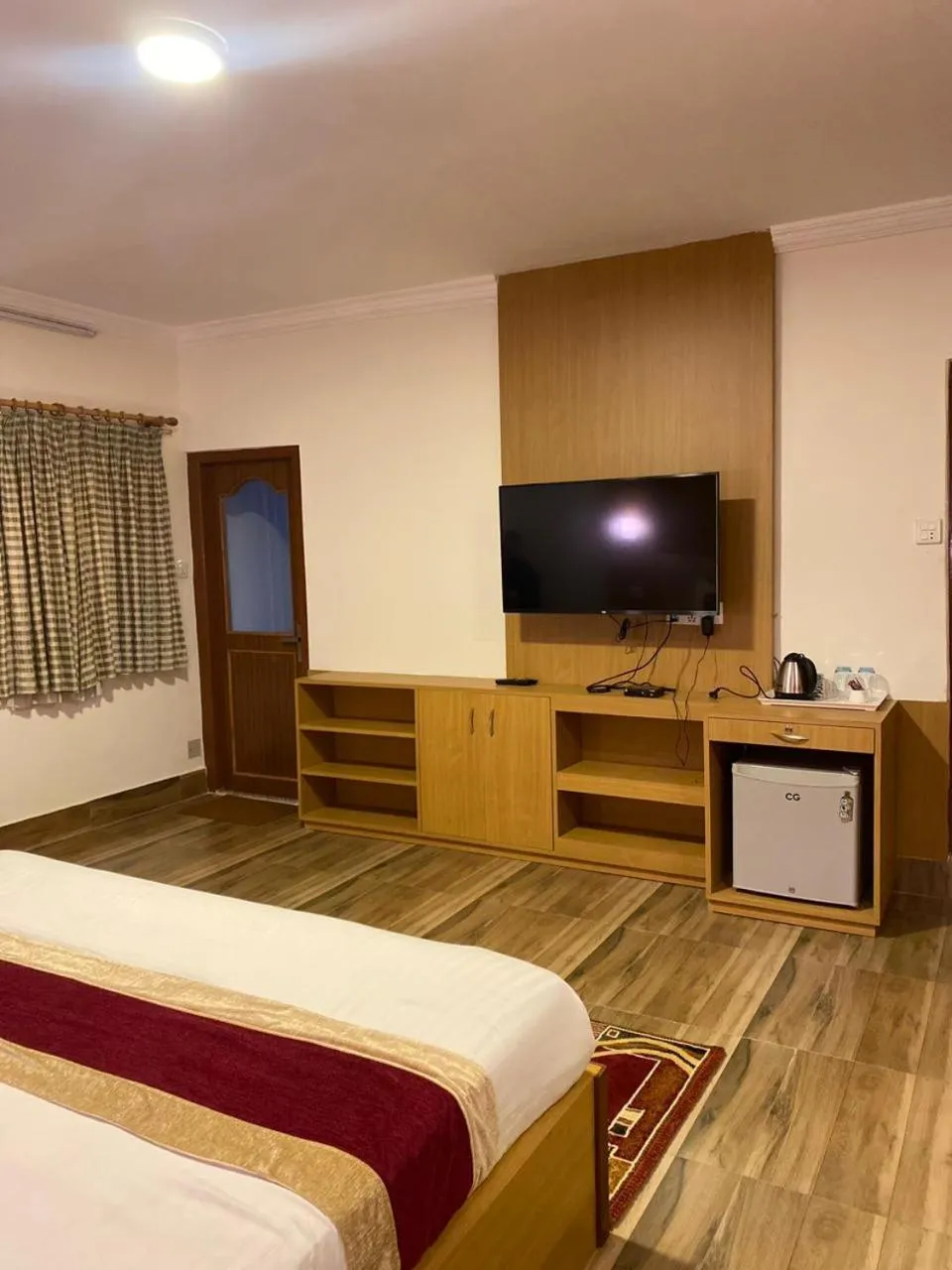 Communal lounge/ TV room, Bed in Chef House Resort