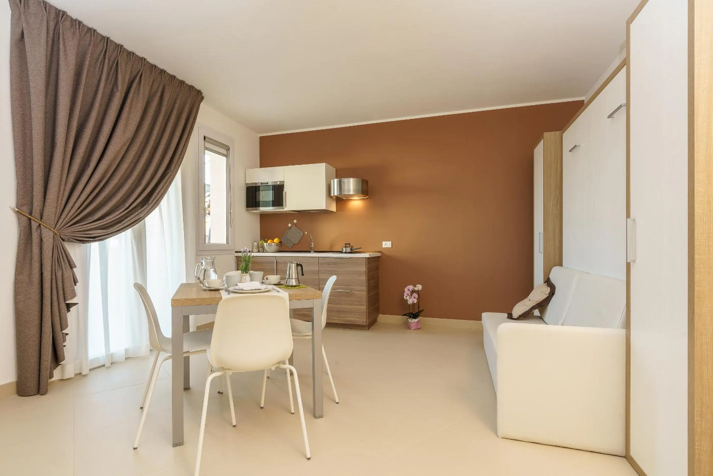 Kitchen or kitchenette in Travini Hotel Residence