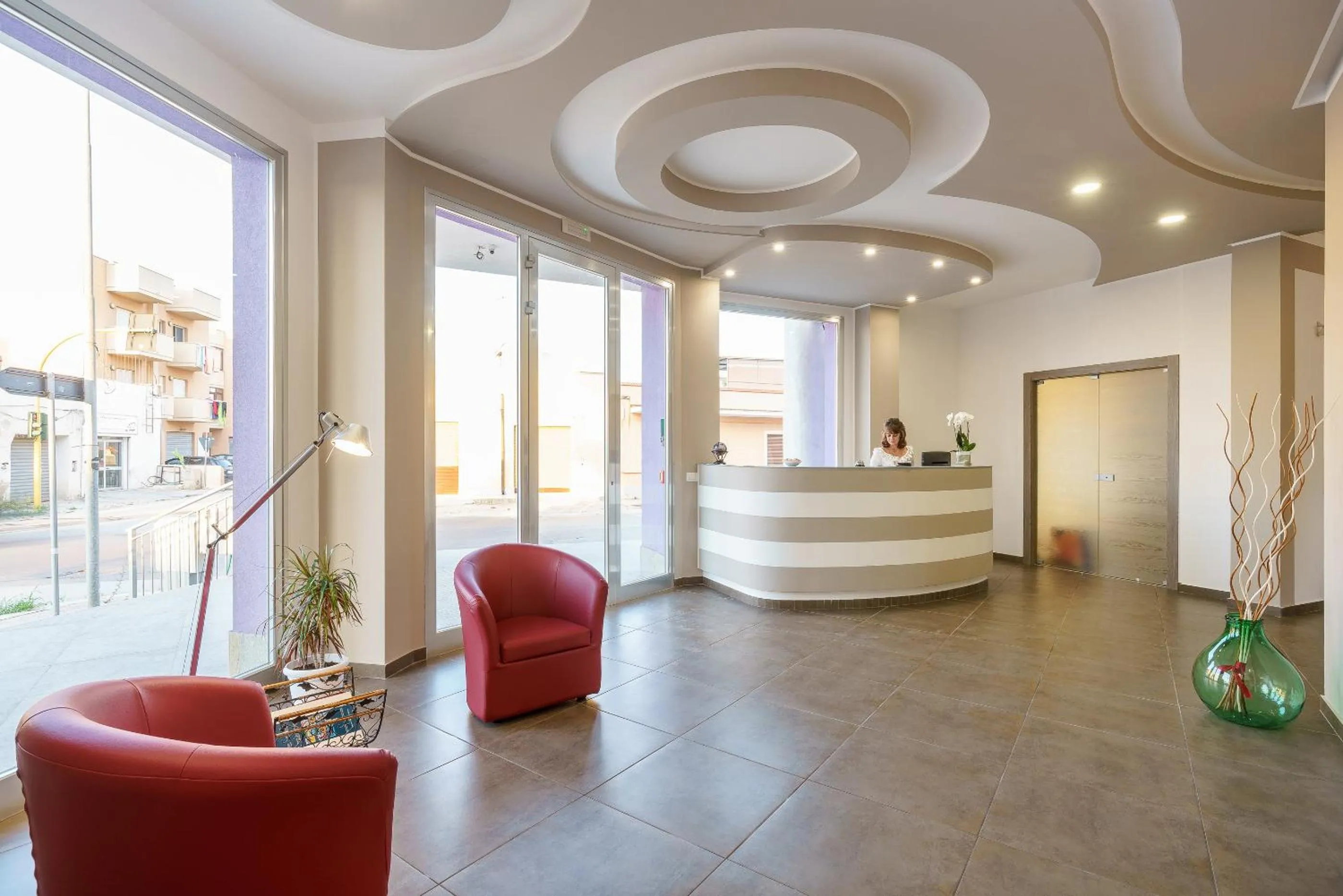 Lobby or reception in Travini Hotel Residence