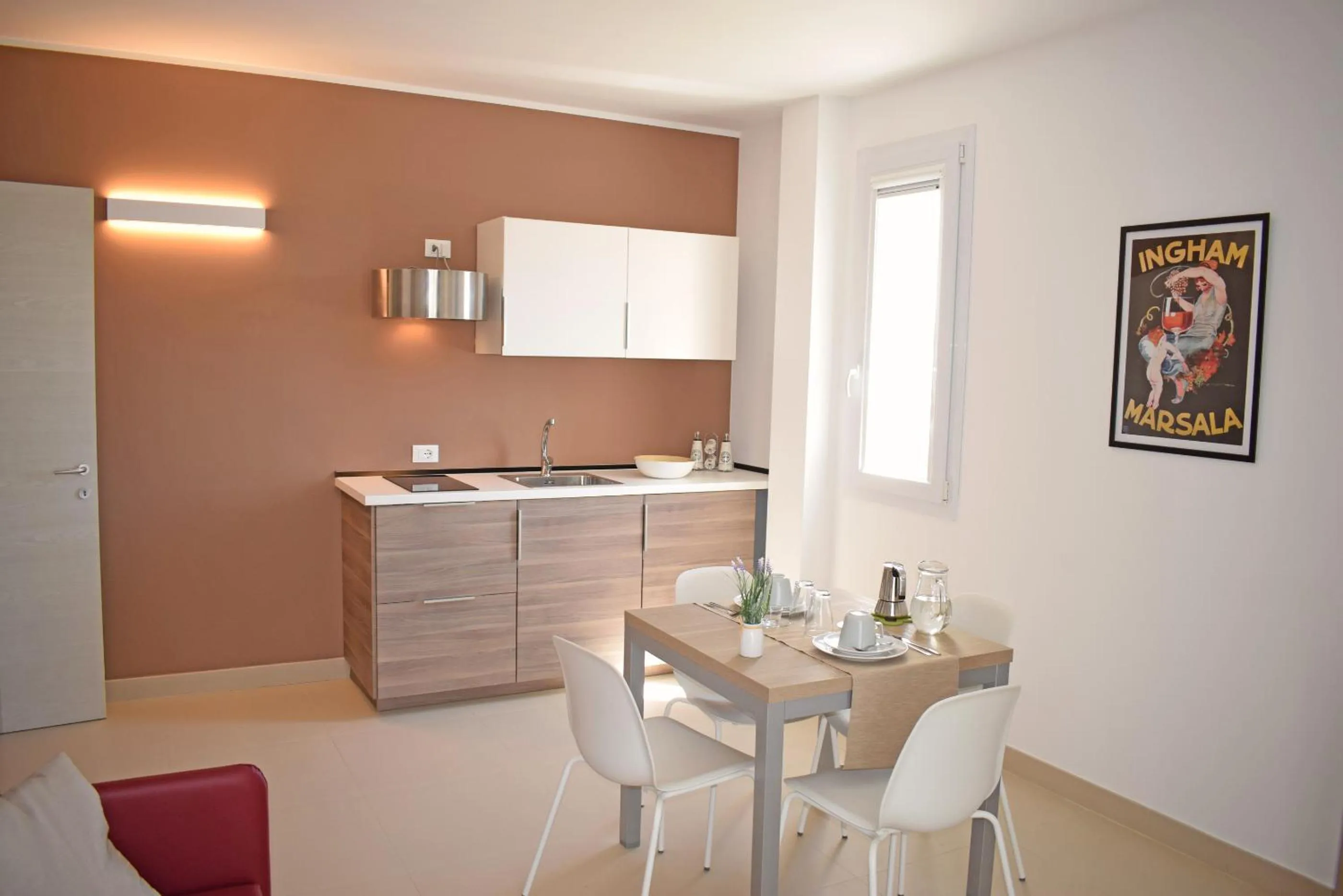Kitchen or kitchenette in Travini Hotel Residence