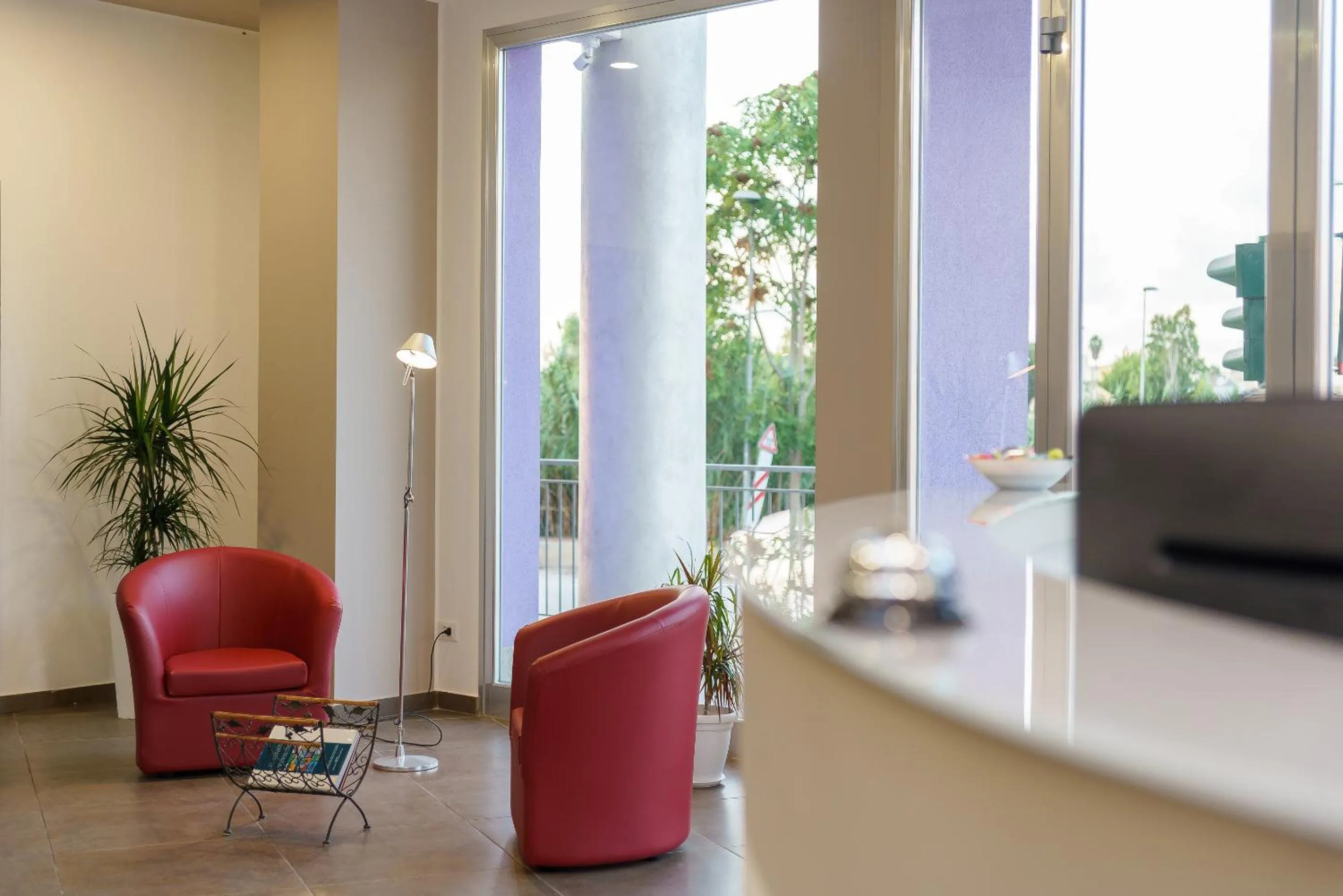 Lobby or reception in Travini Hotel Residence