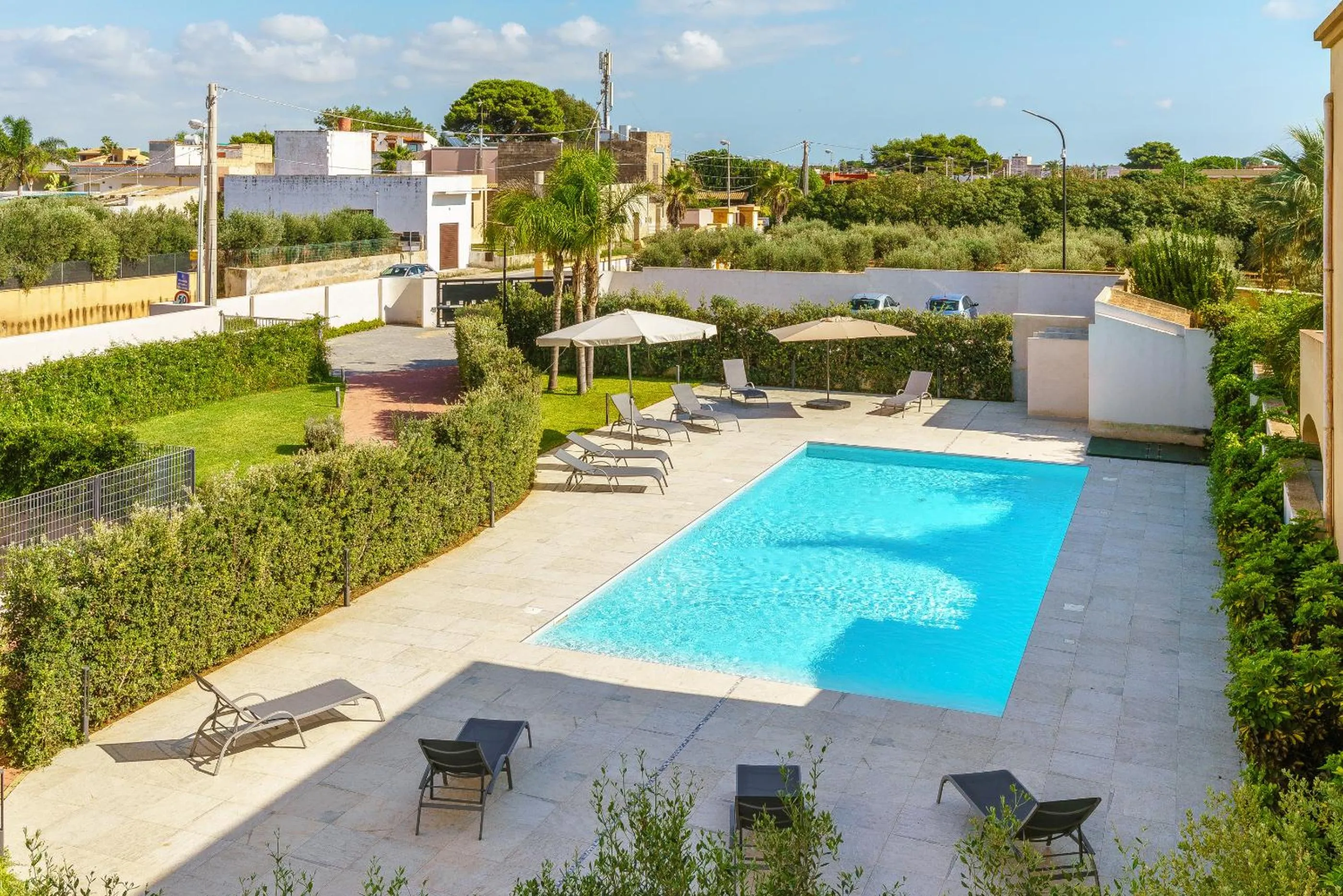 Pool view in Travini Hotel Residence