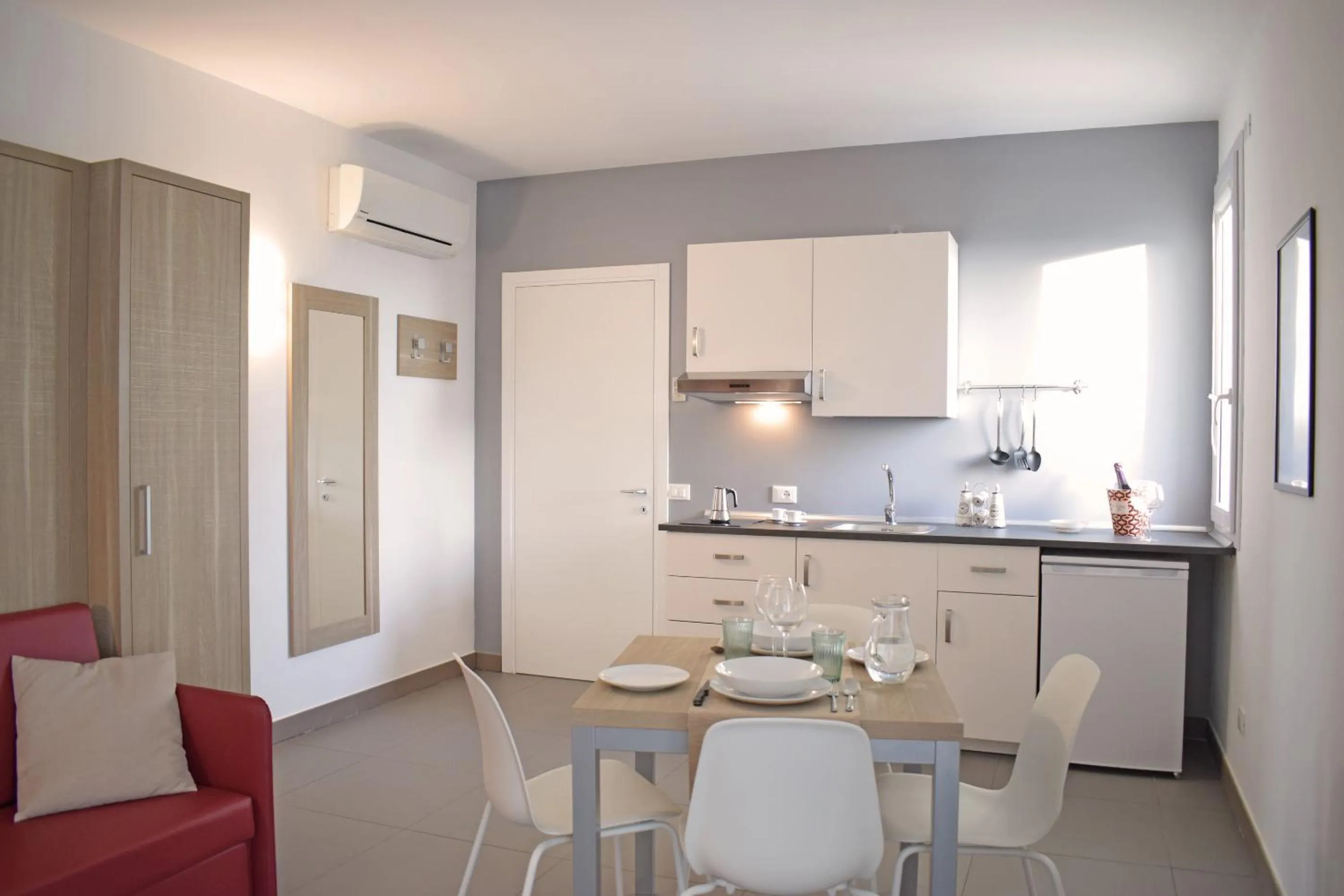 Kitchen or kitchenette in Travini Hotel Residence