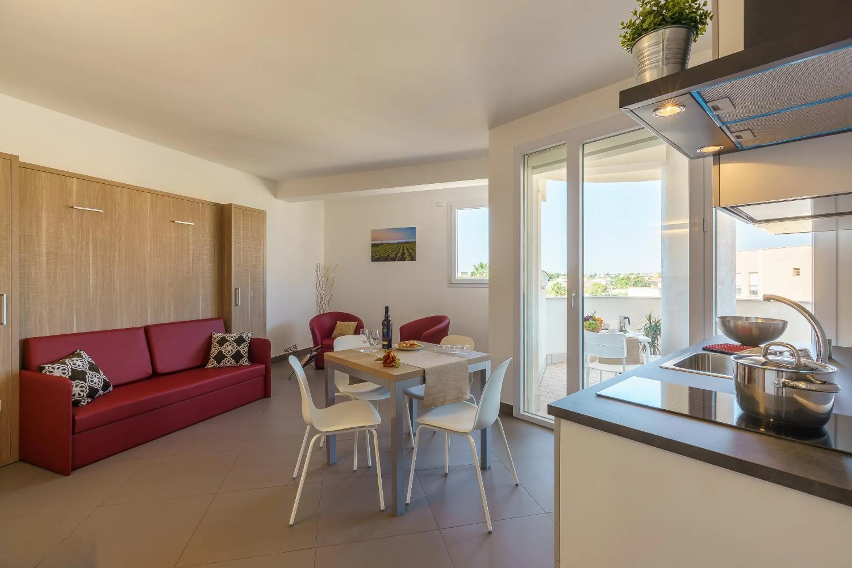 Kitchen or kitchenette in Travini Hotel Residence