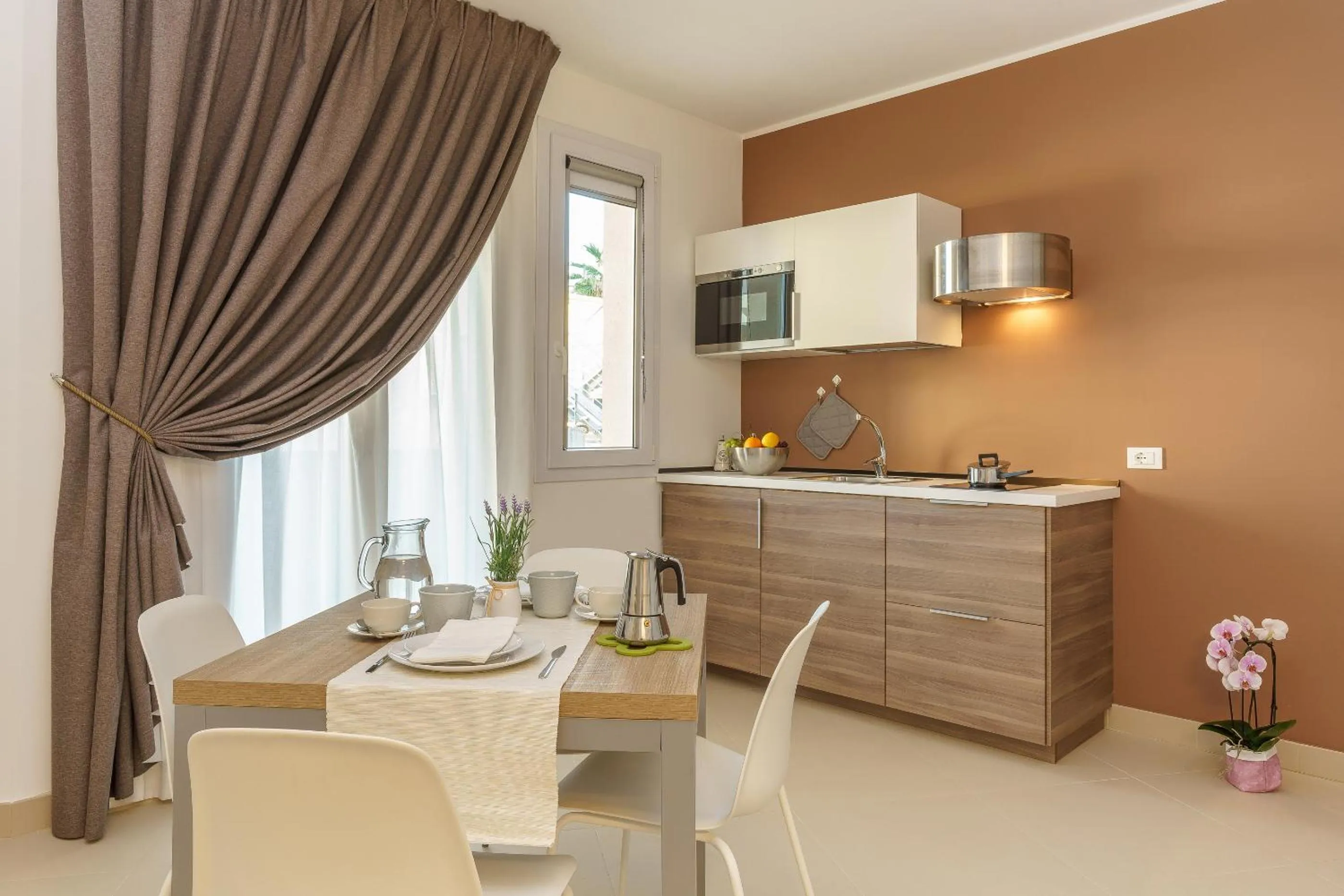 Kitchen or kitchenette in Travini Hotel Residence