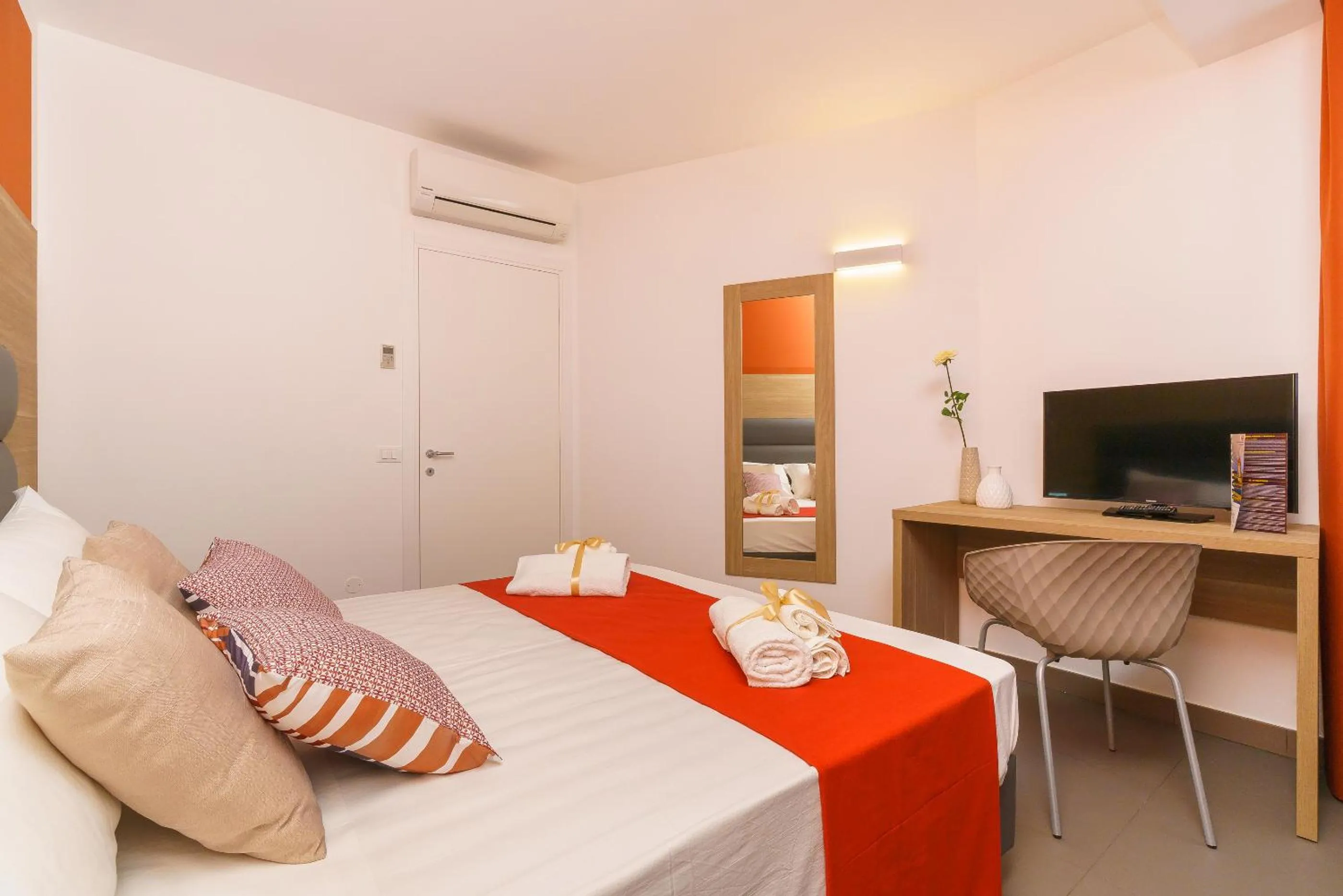 Bed in Travini Hotel Residence