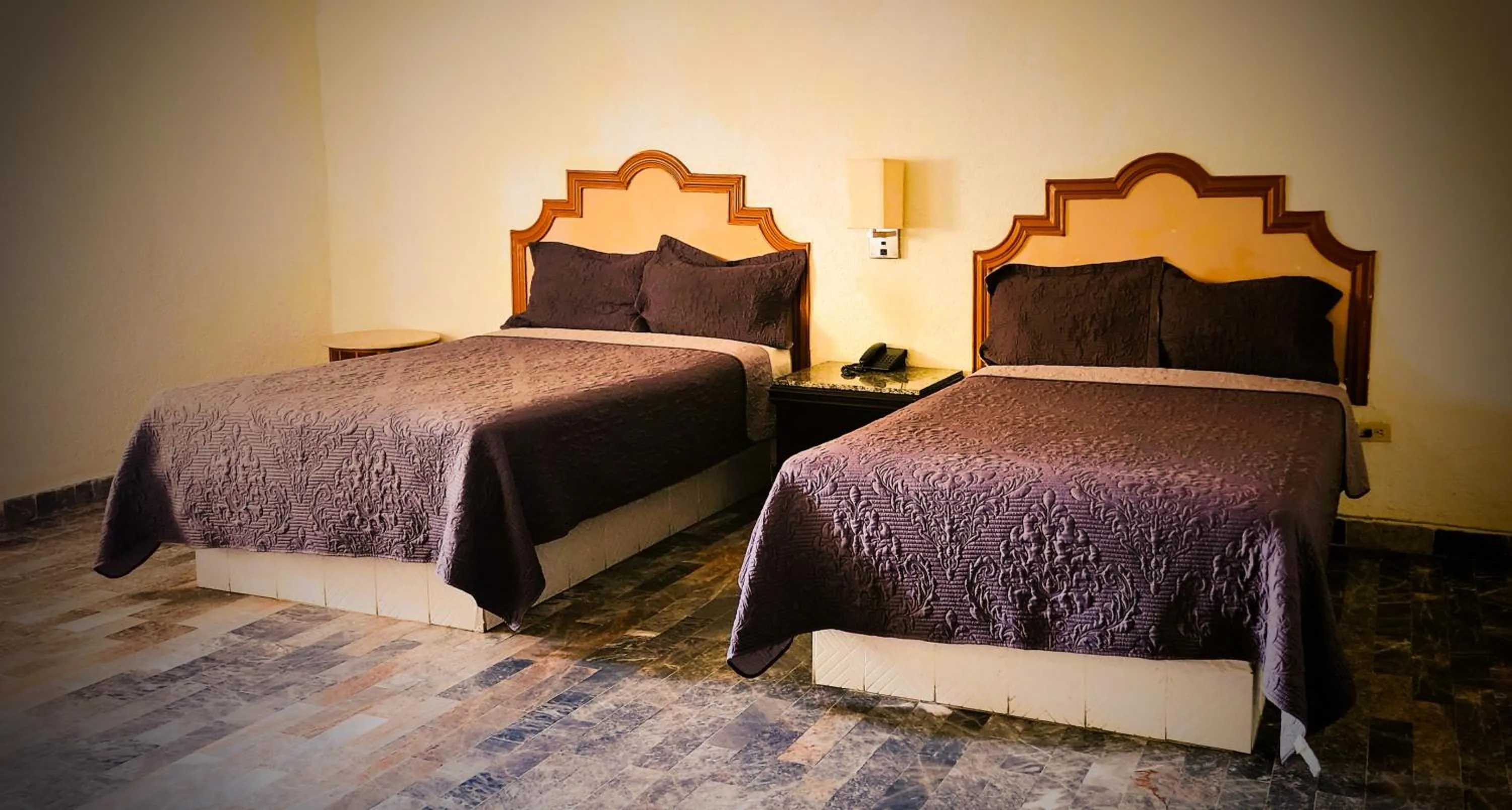 Bed in Hotel Paraiso